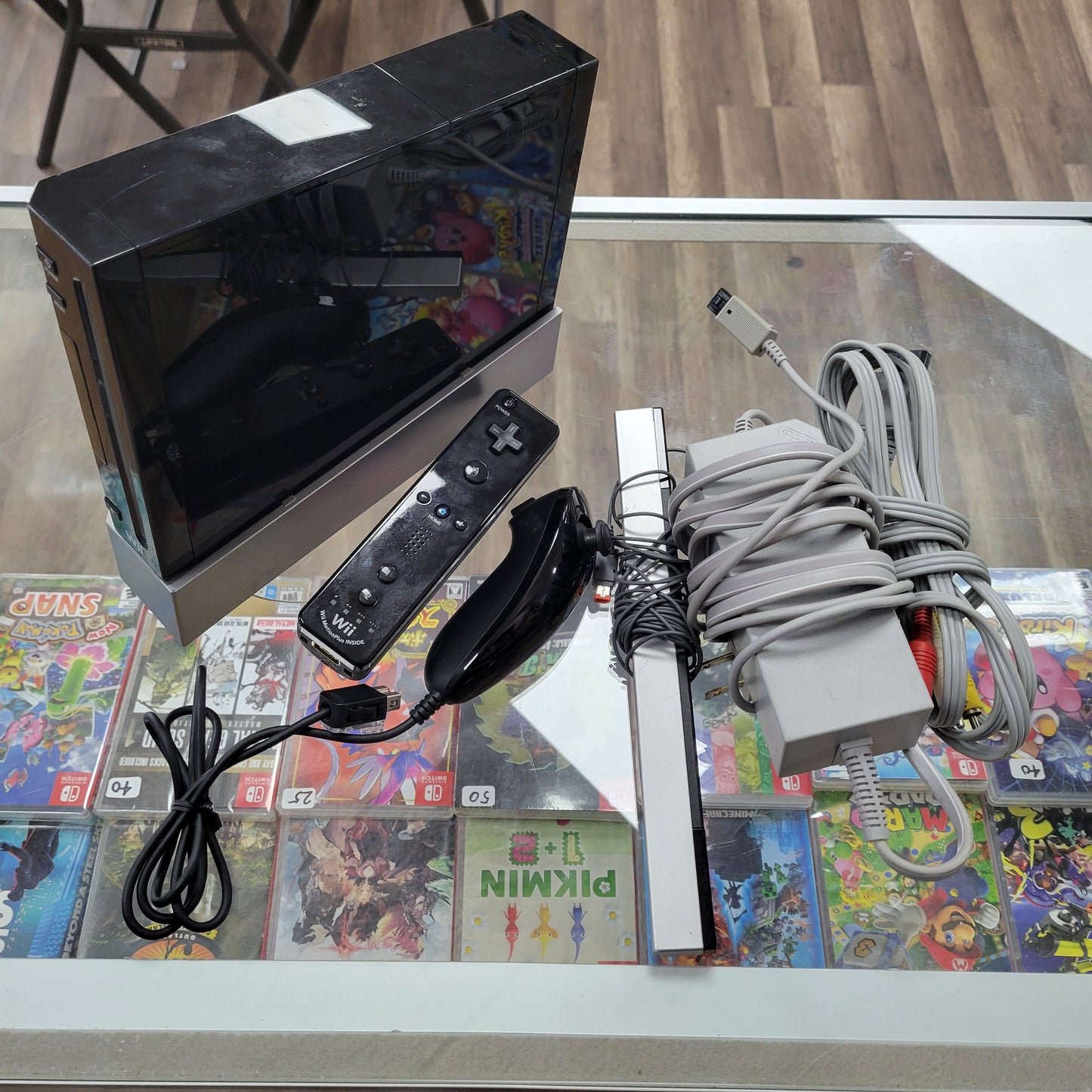 Black Nintendo Wii System Cables and Controller Included