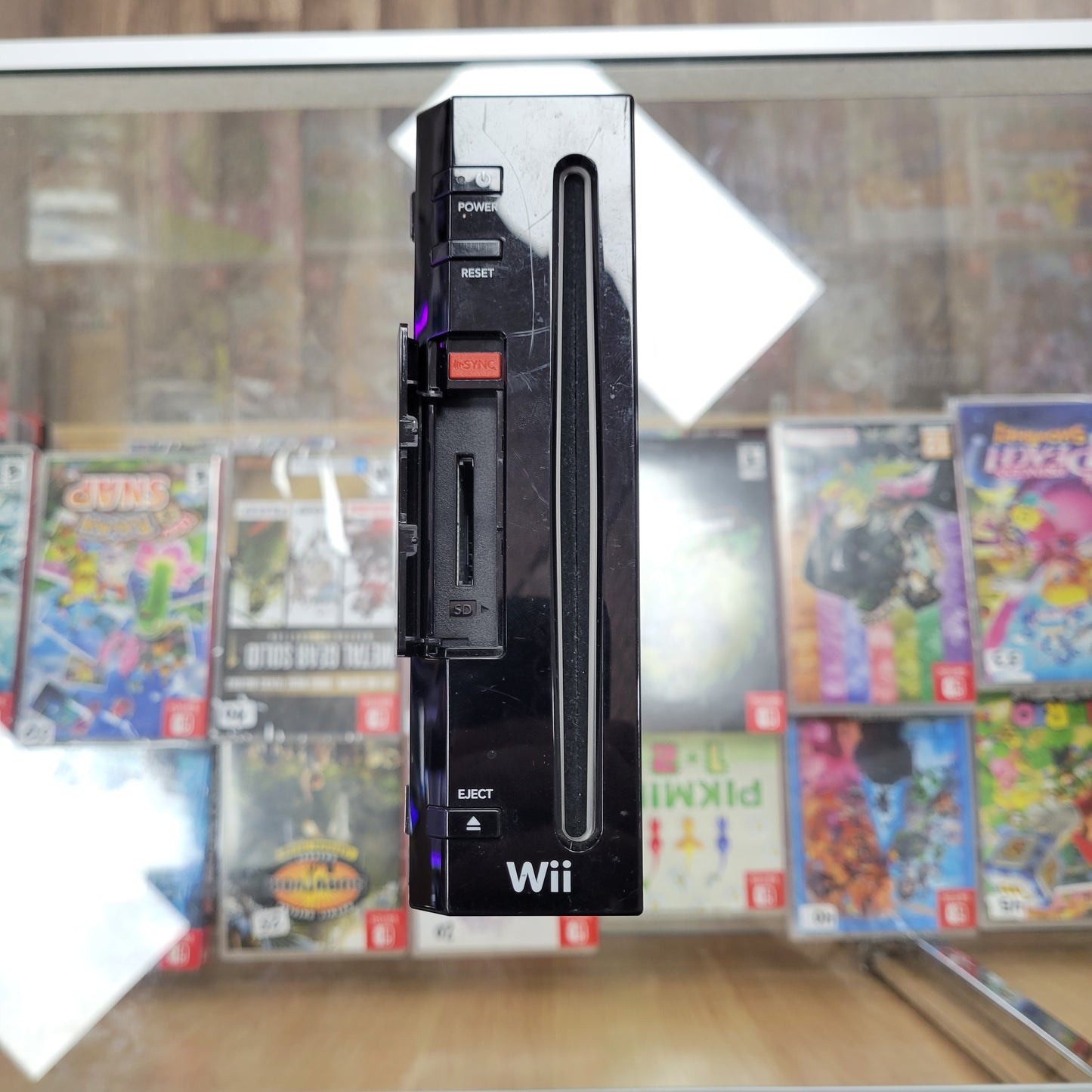 Black Nintendo Wii System Cables and Controller Included