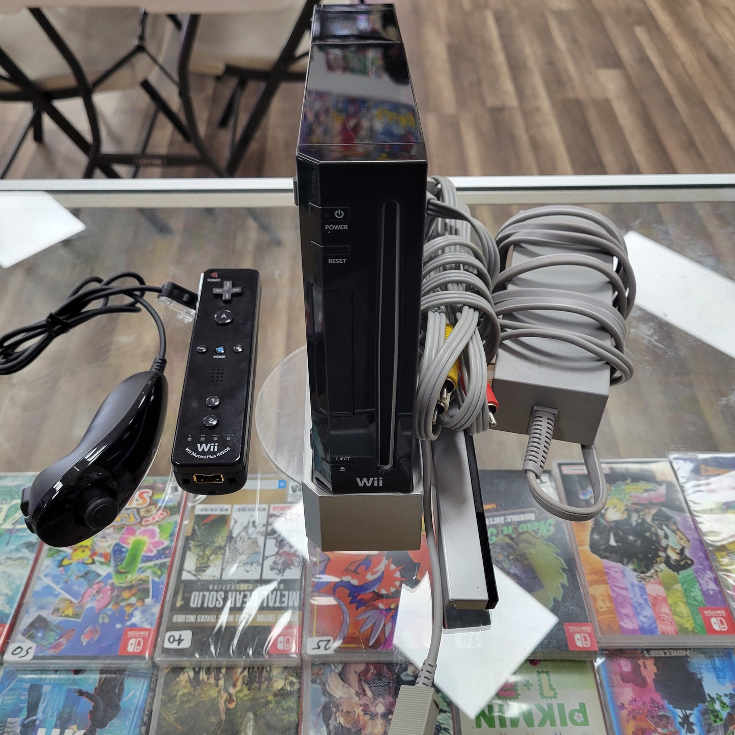 Black Nintendo Wii System Cables and Controller Included