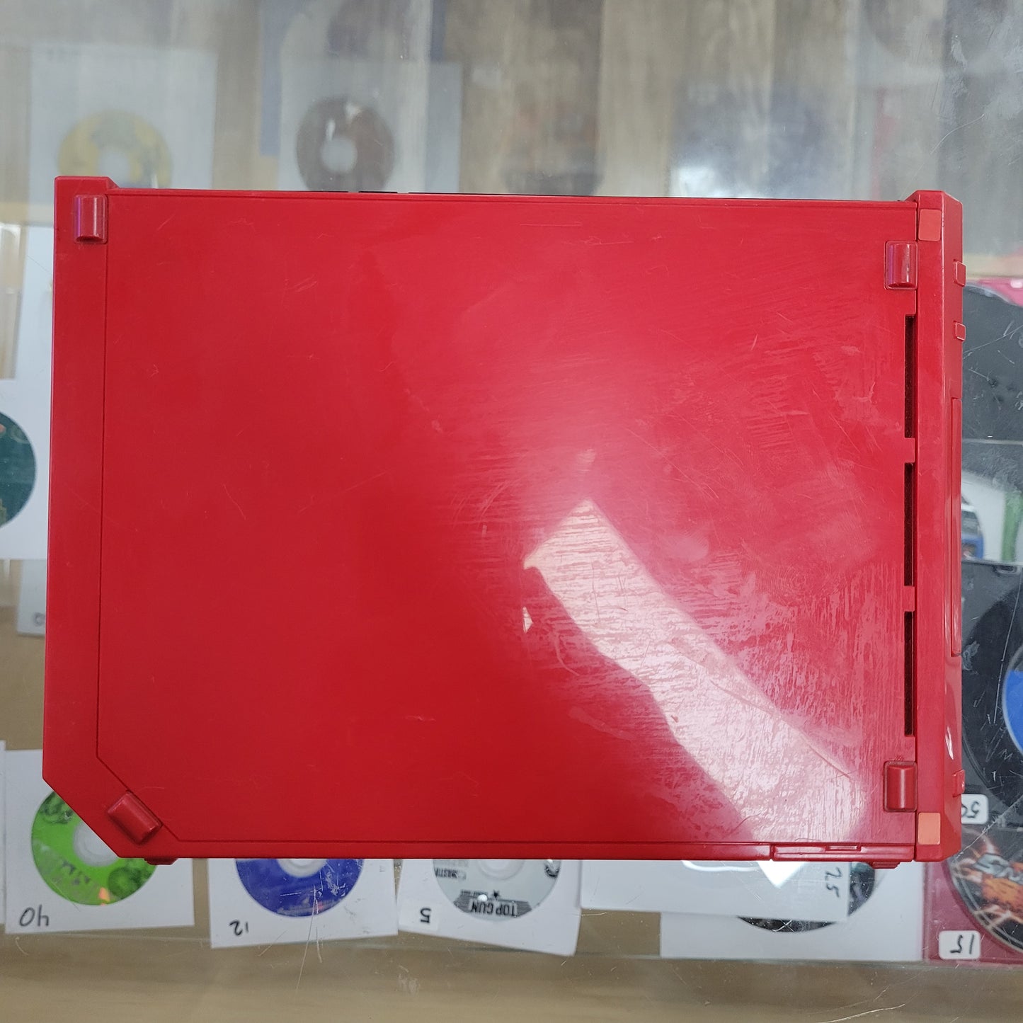 Red Nintendo Wii System with controllers and cables