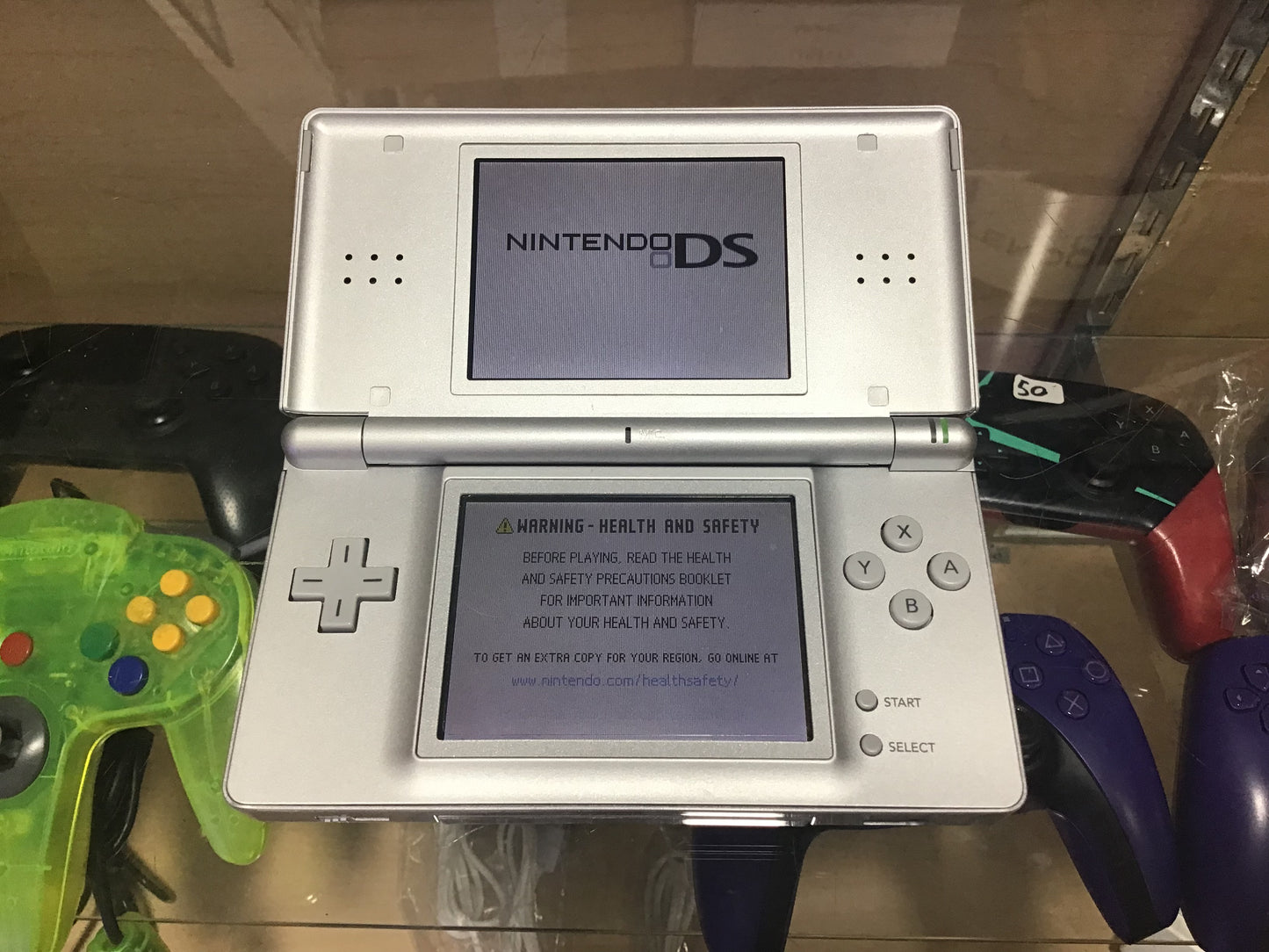 Silver Nintendo DS Lite Handheld System with Charger and Box