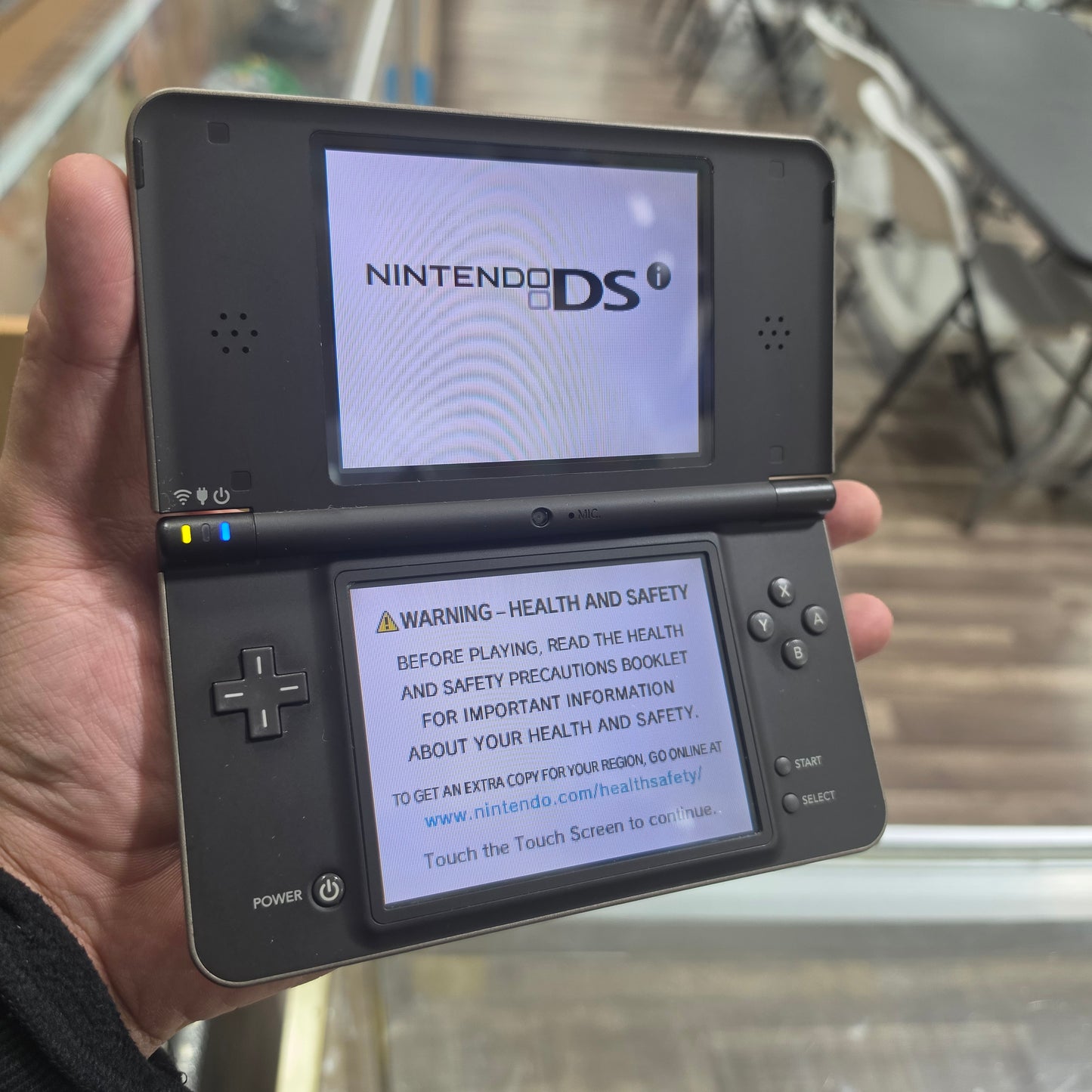 Nintendo DSi XL Bronze Nintendo DSi Handheld System with Charger