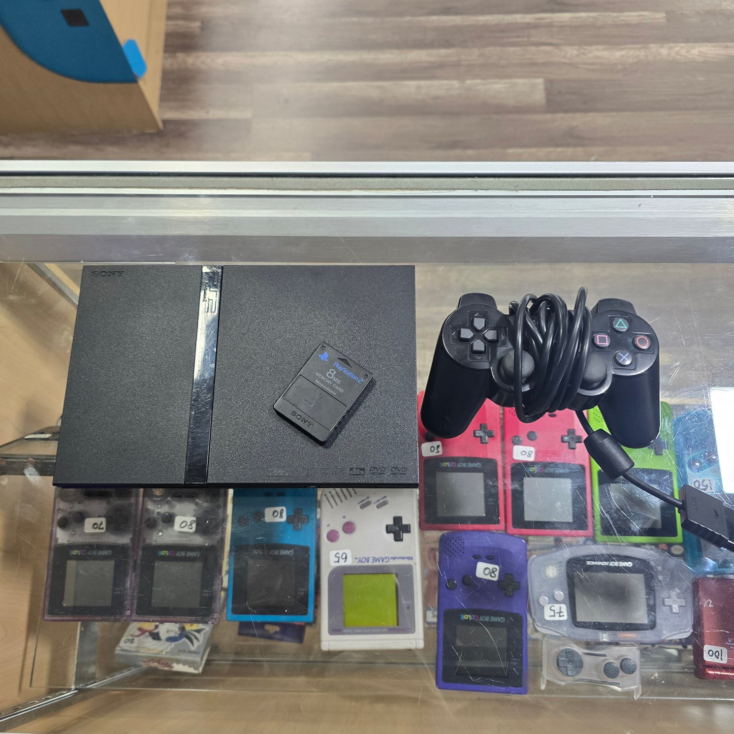 Playstation 2 Slim System With controller, cables, and memory card