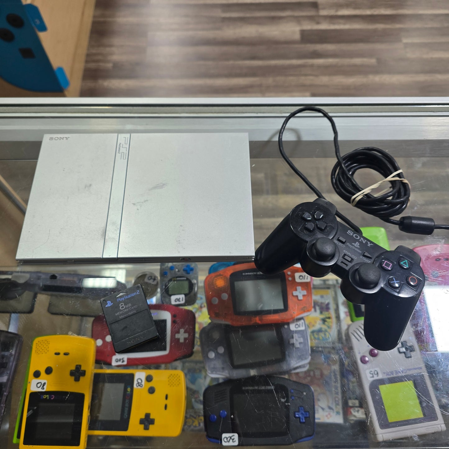 Silver Playstation 2 System with Controller and Wires (Plus Memory card)