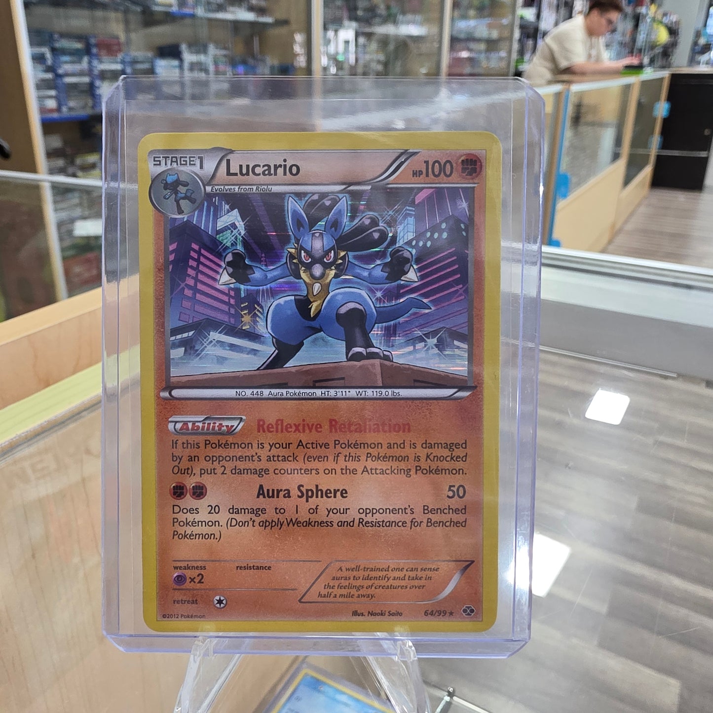 Lucario - 64/99 (Cosmos Holo) - Blister Exclusives (NM)