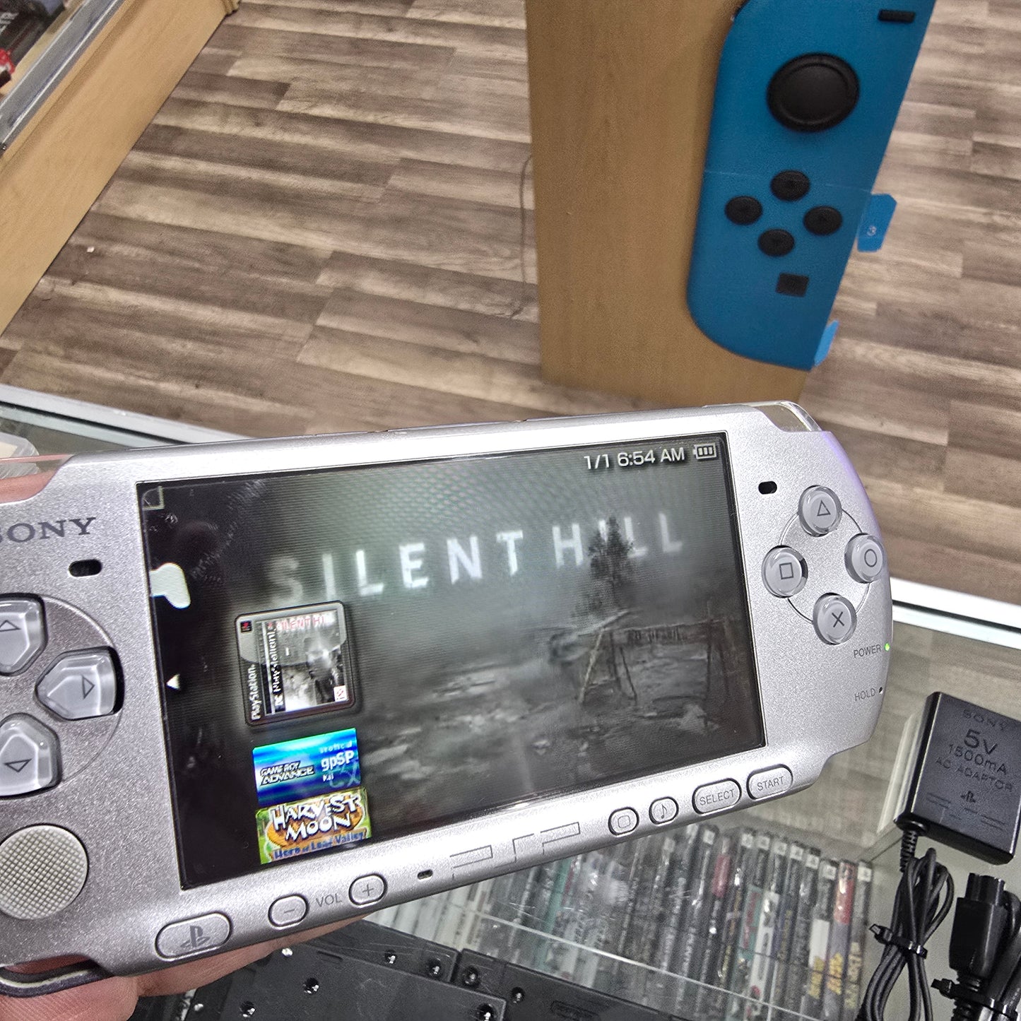 PSP Handheld System with Charger and Digital Games
