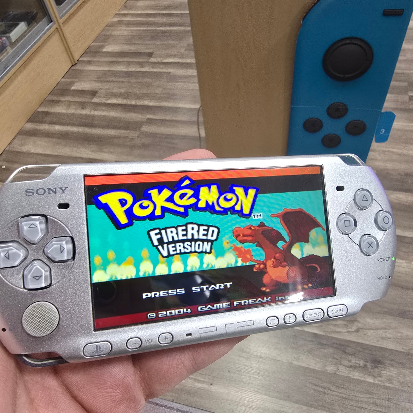PSP Handheld System with Charger and Digital Games