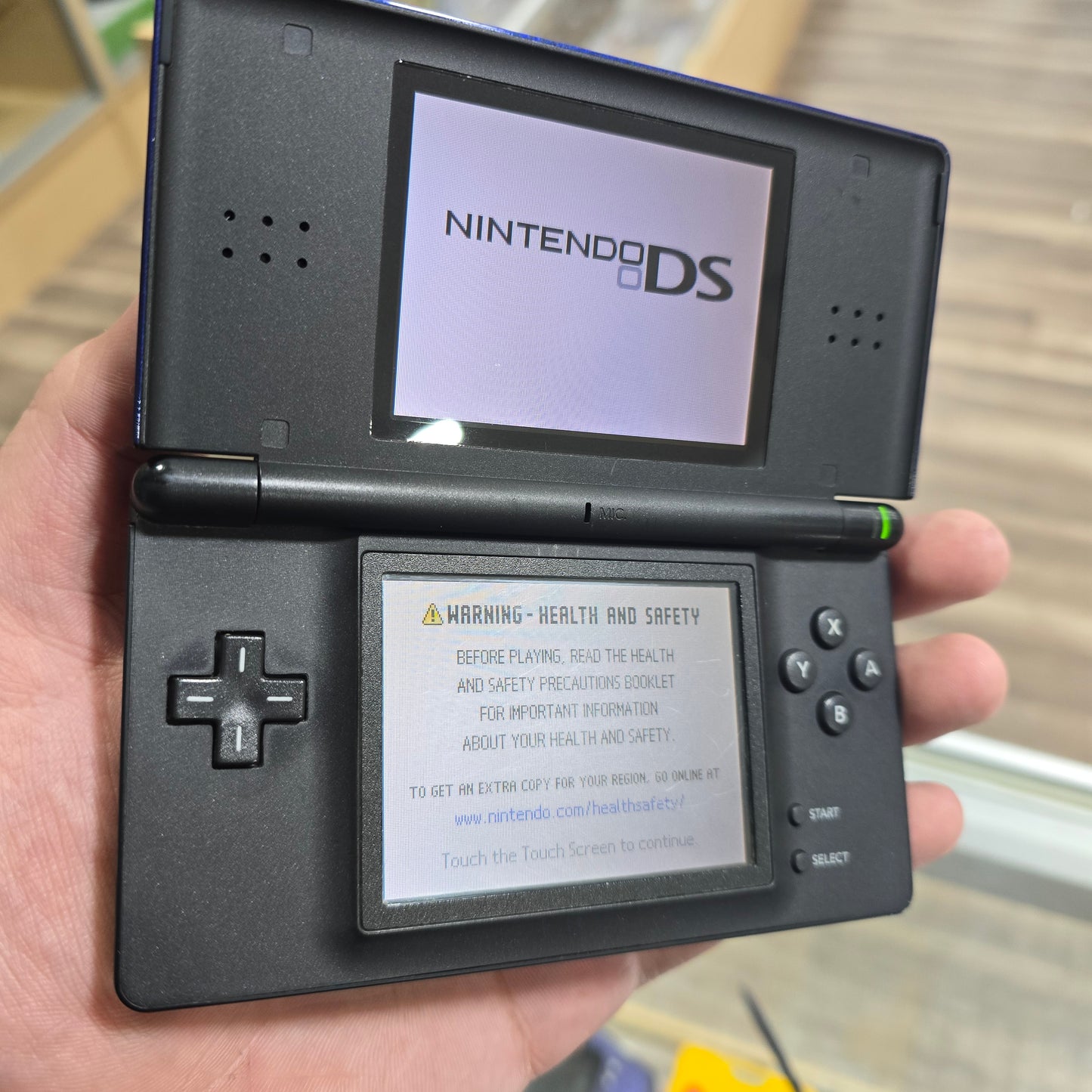 Blue Nintendo DS Lite Handheld System with Charger (Has Light Scratches on Touch Screen)