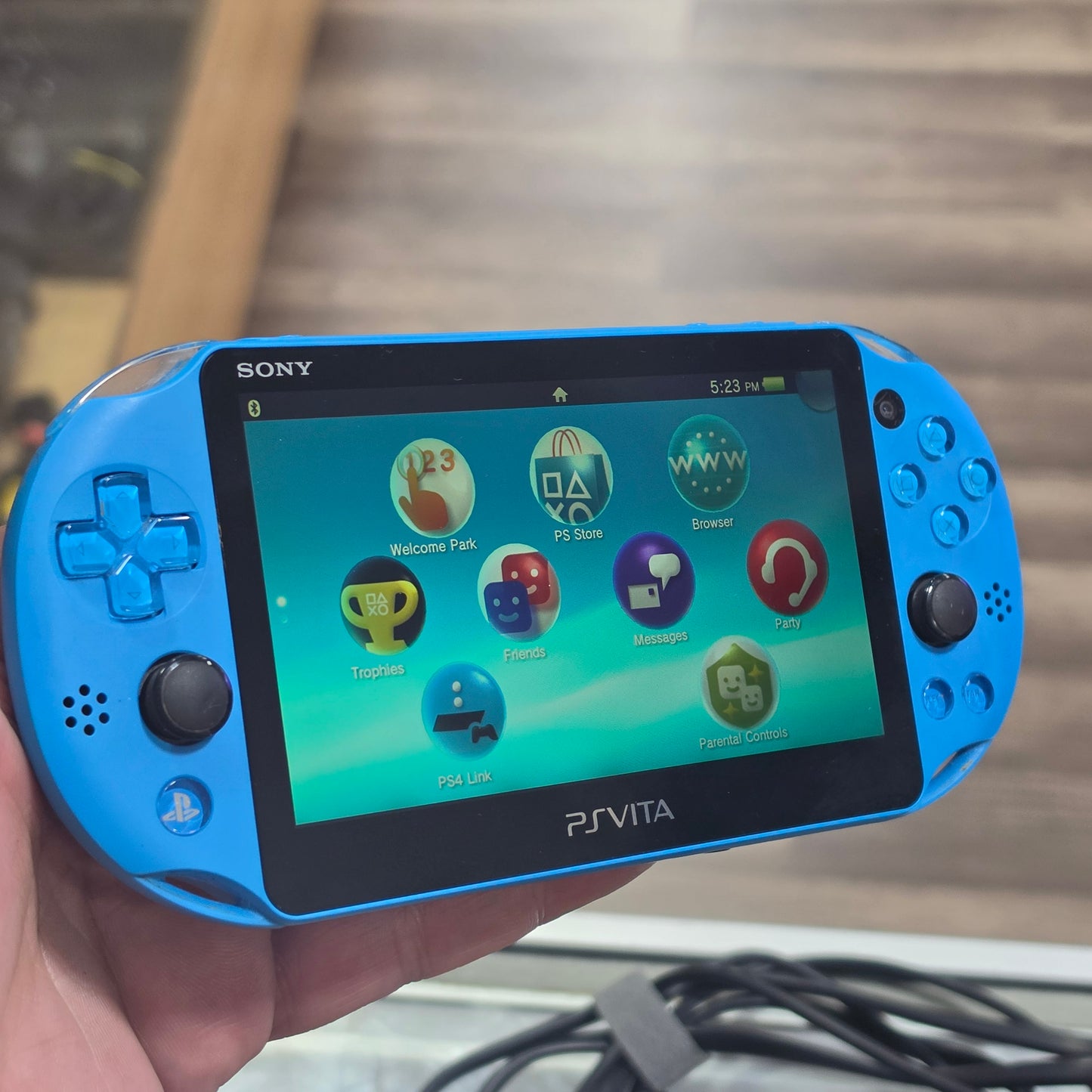 PlayStation Vita Slim Aqua Blue Handheld System with Charger 2000 Model