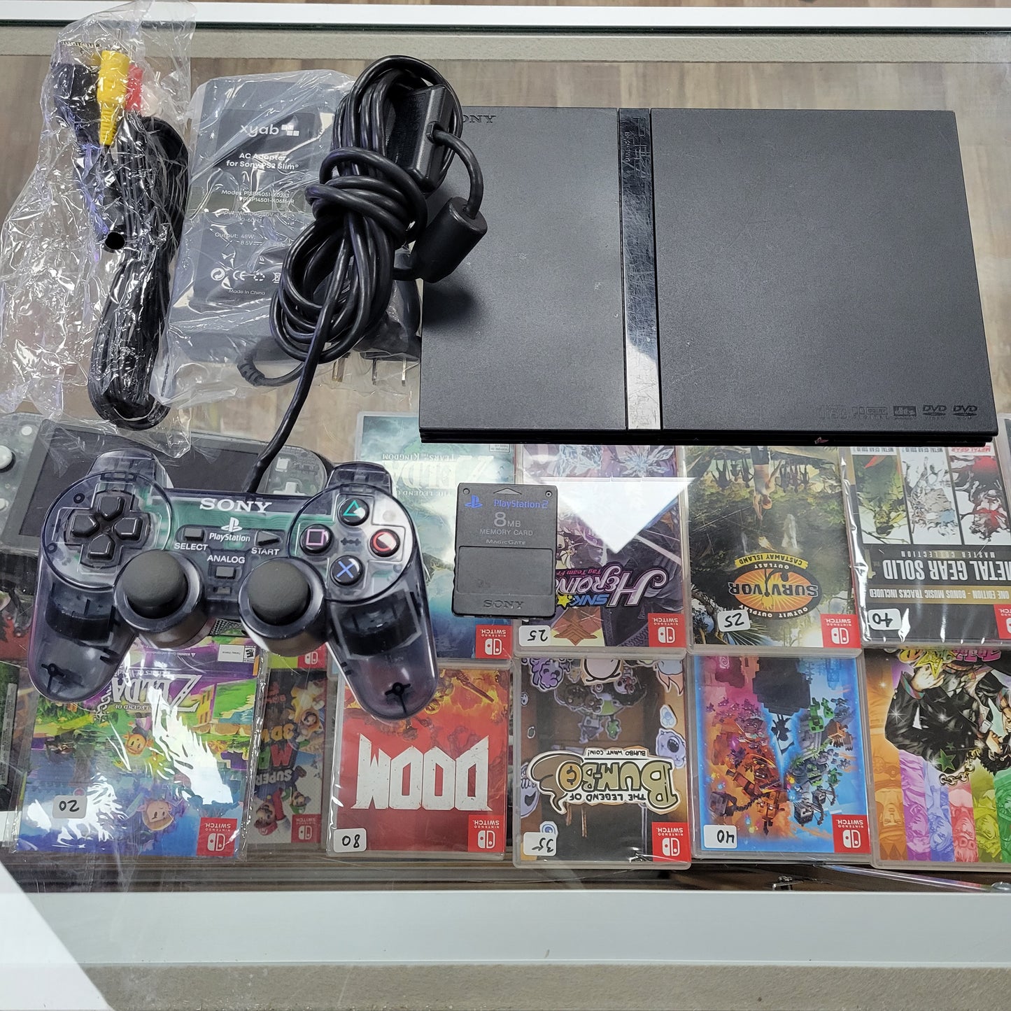 Playstation 2 Slim System With controller cables and memory card