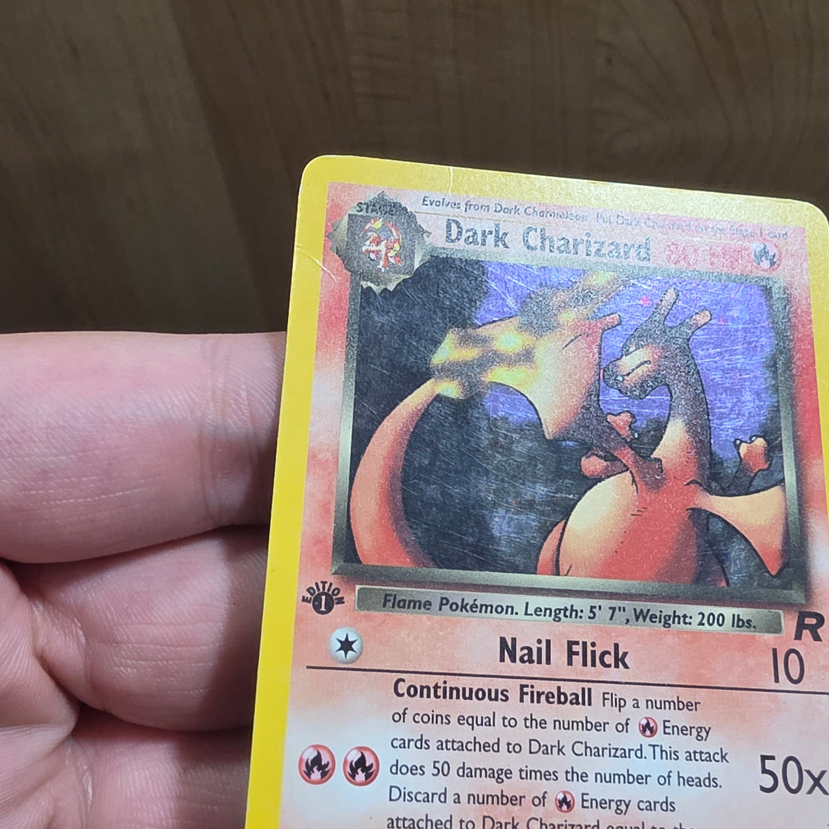 (MP) Dark Charizard (4) - Team Rocket 1st Edition (Swirl)