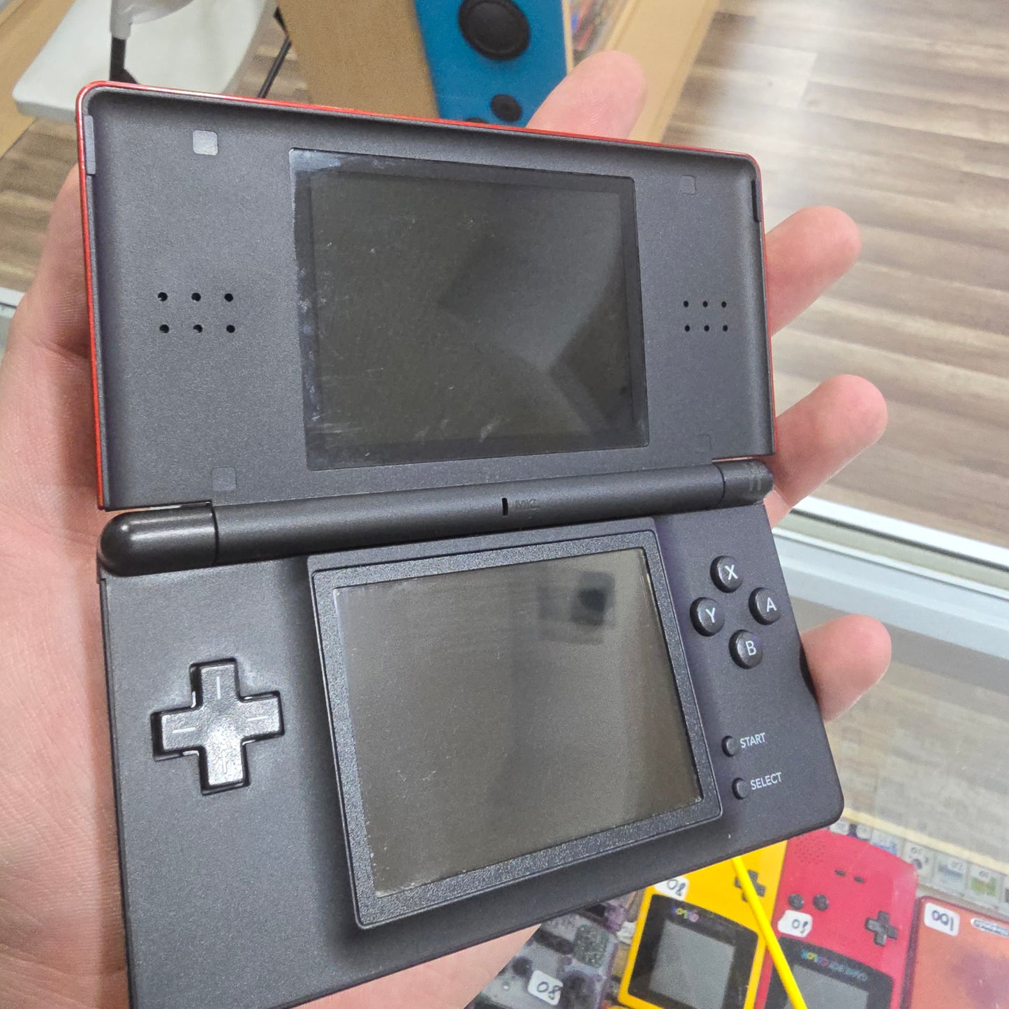 Red Nintendo DS Lite Handheld System with Charger