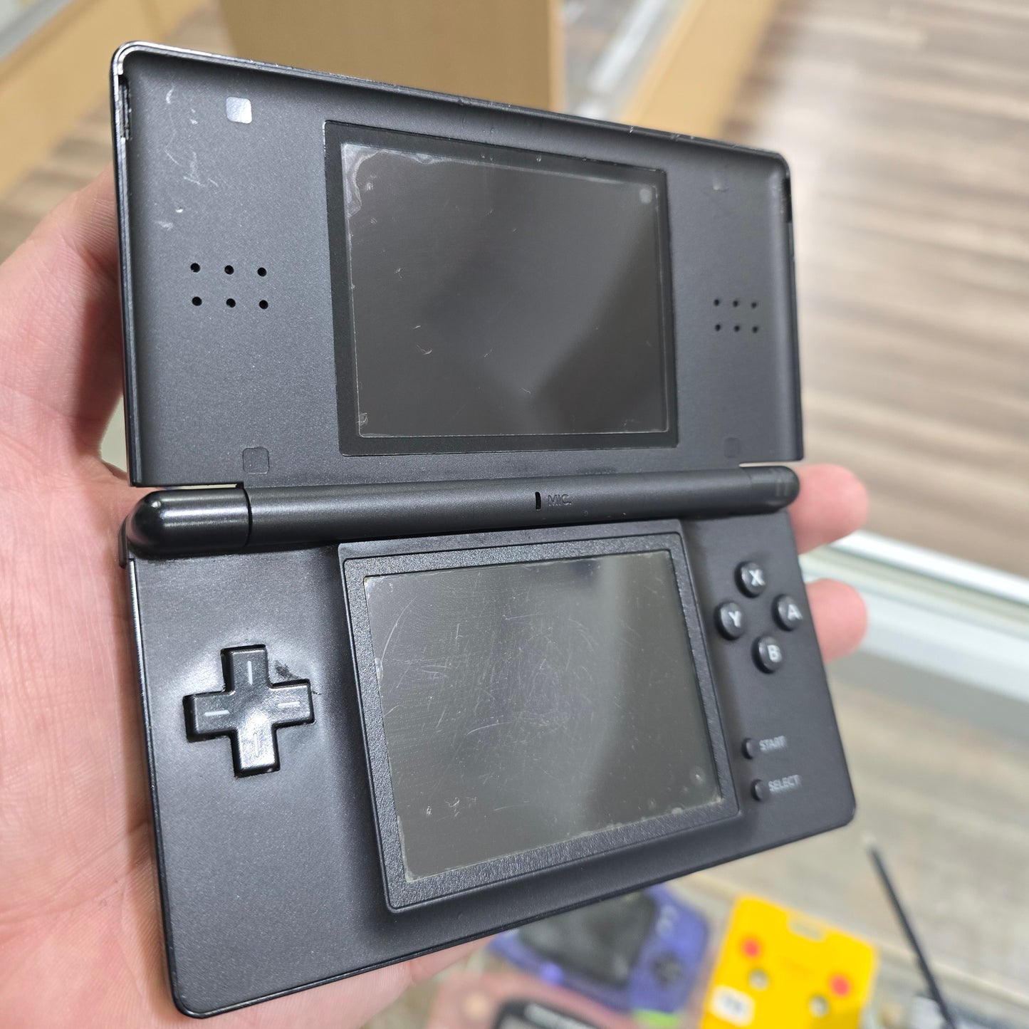 Black Nintendo DS Lite Handheld System with Charger (Has Screen Protector)