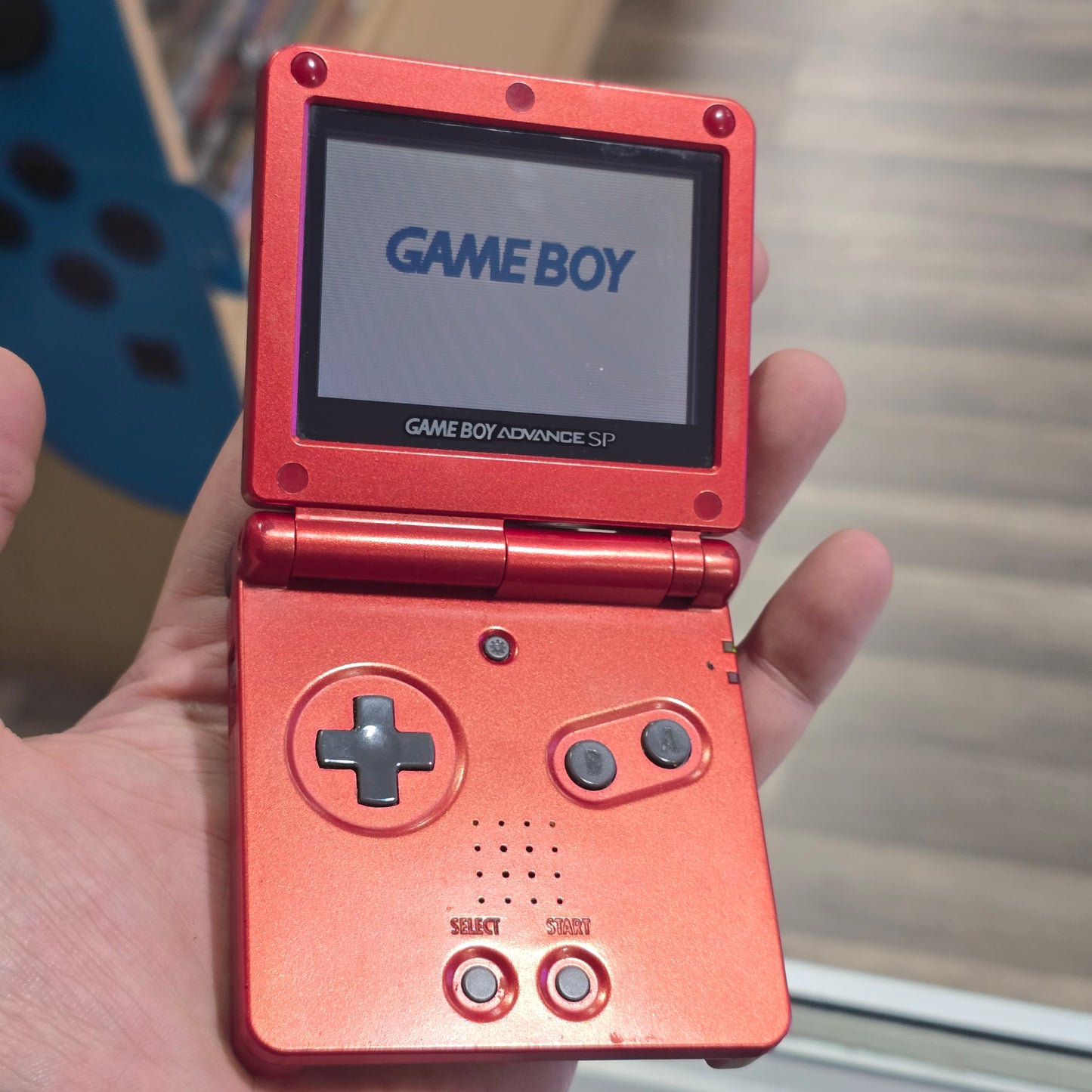 Red Nintendo Gameboy Advance SP Handheld System with Charger