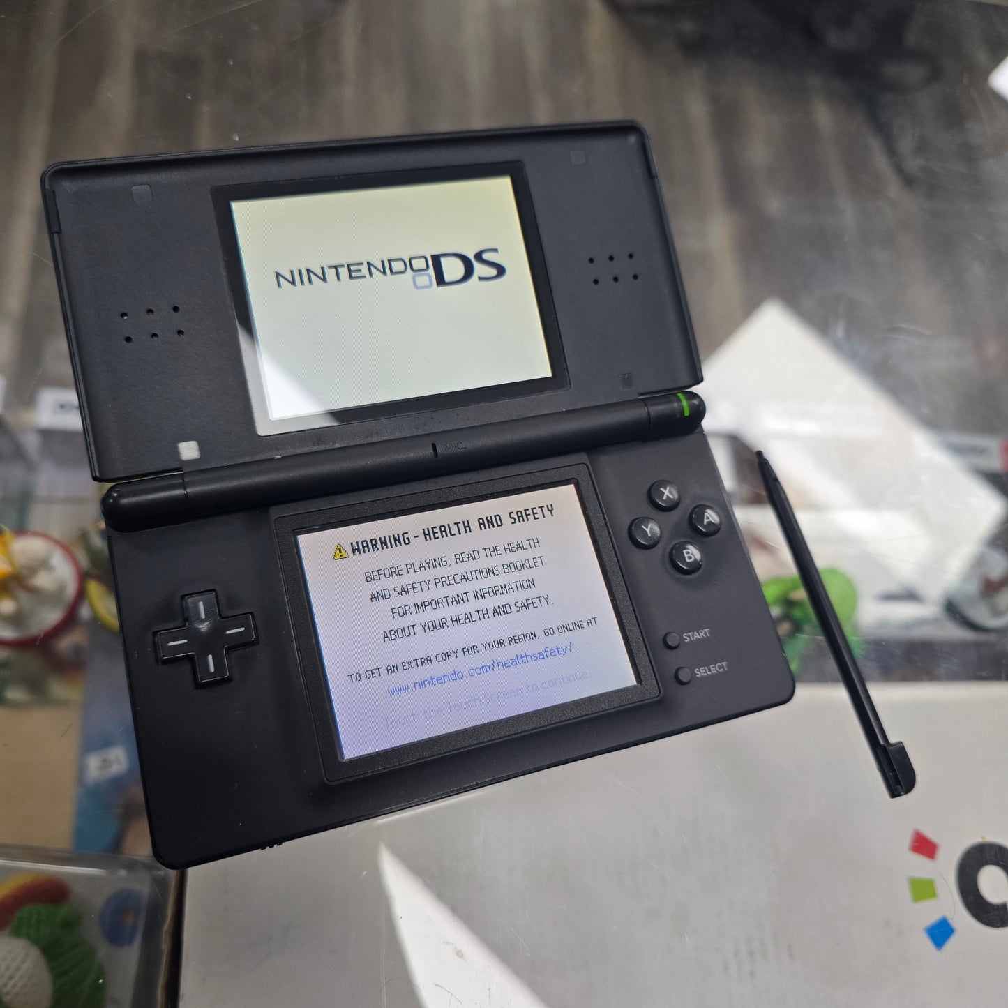 Black Nintendo DS Lite Handheld System with Charger