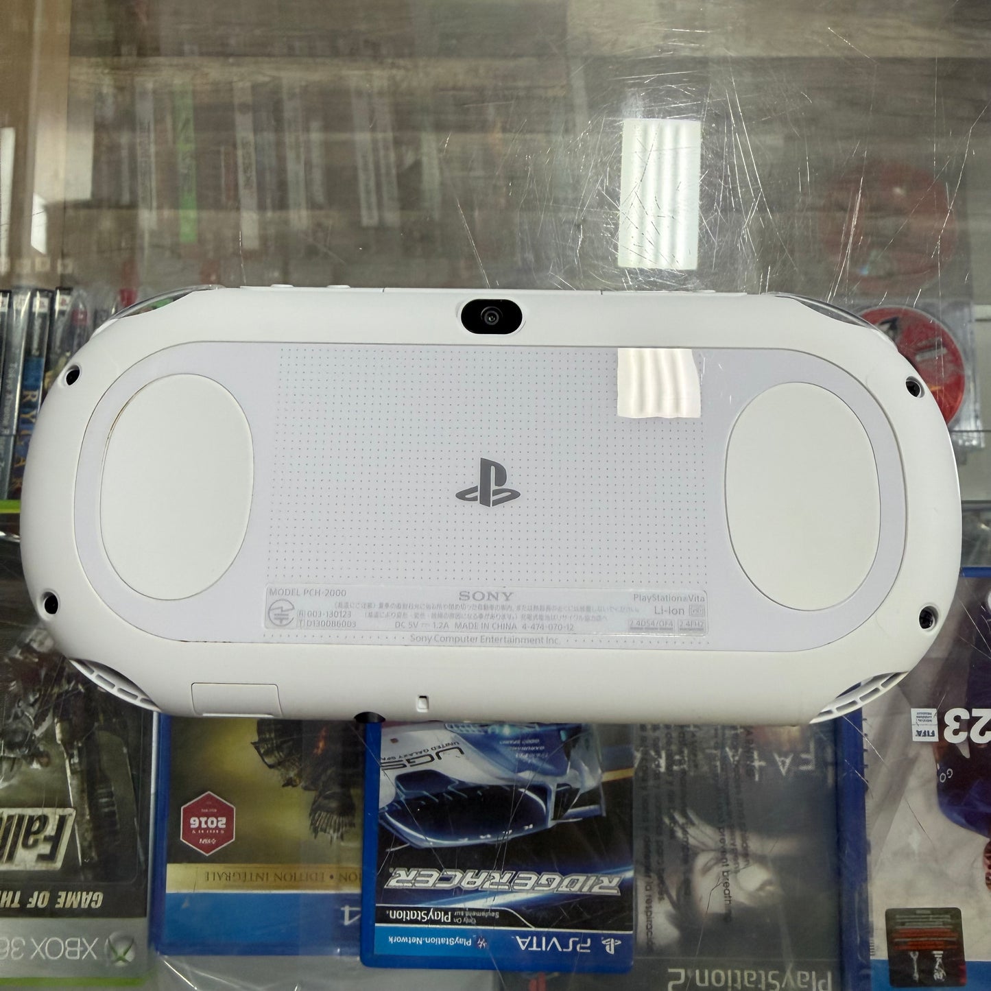 White Playstation Vita 2000 Handheld System with Charger (JP) (Region Free)