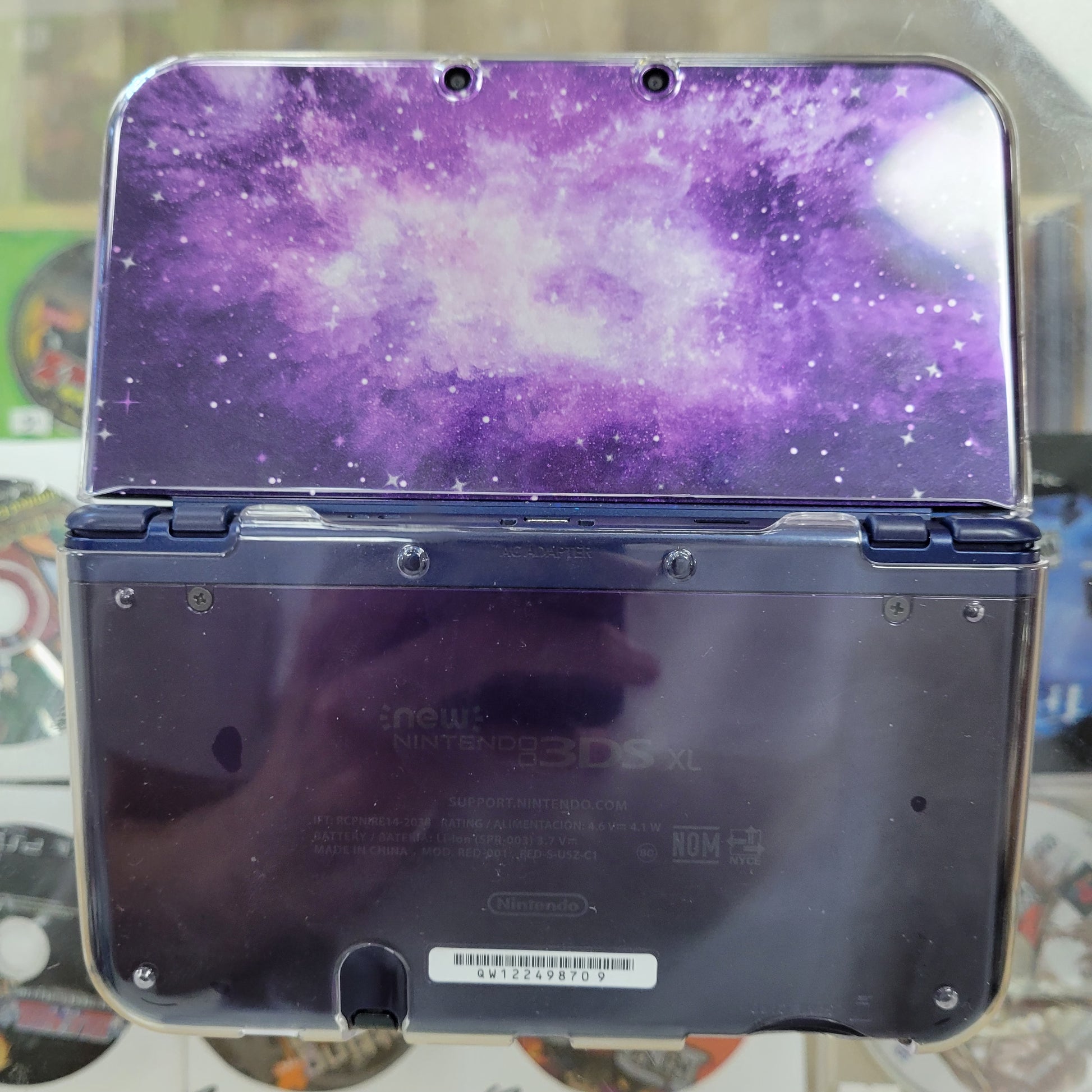 New Nintendo 3DS XL Galaxy in, Purple plus two games and one new 2024 charger