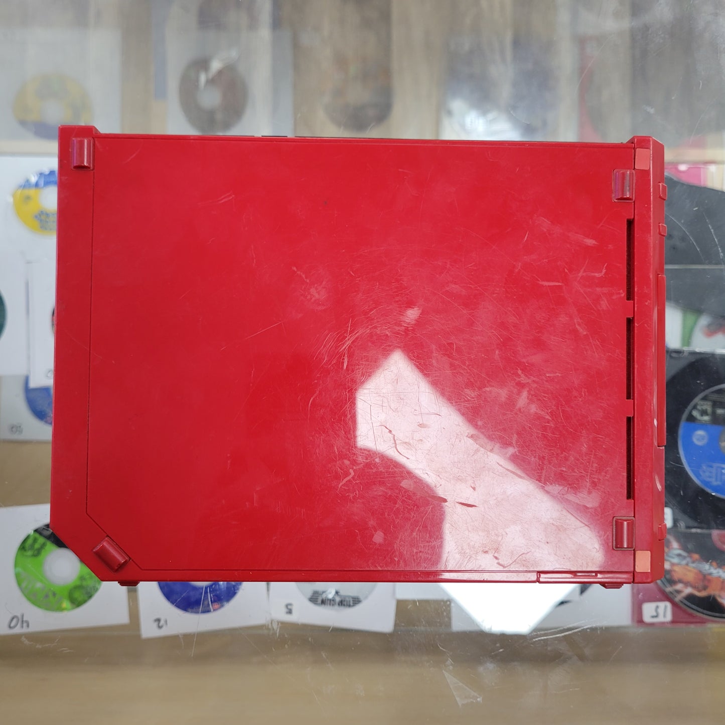 Red Nintendo Wii System with controllers and cables