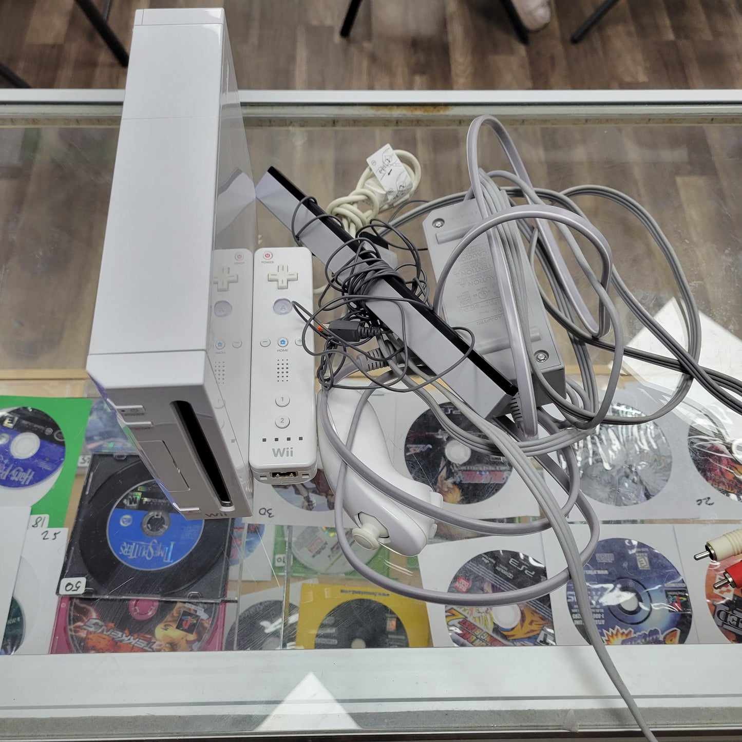 White Nintendo Wii System With controller and cables