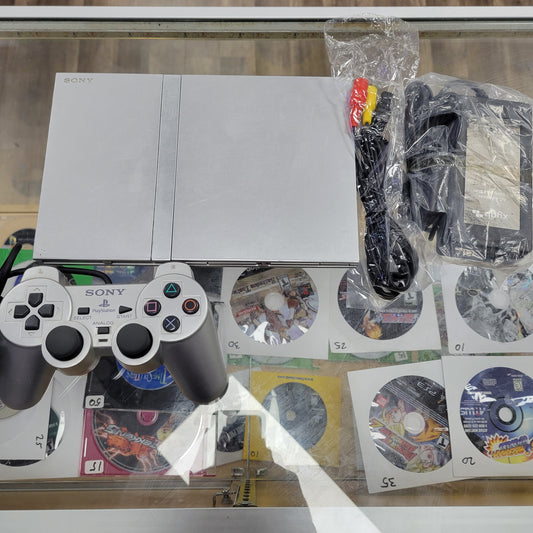 Silver Playstation 2 Slim System comes with controller and cables 8 MB memory card