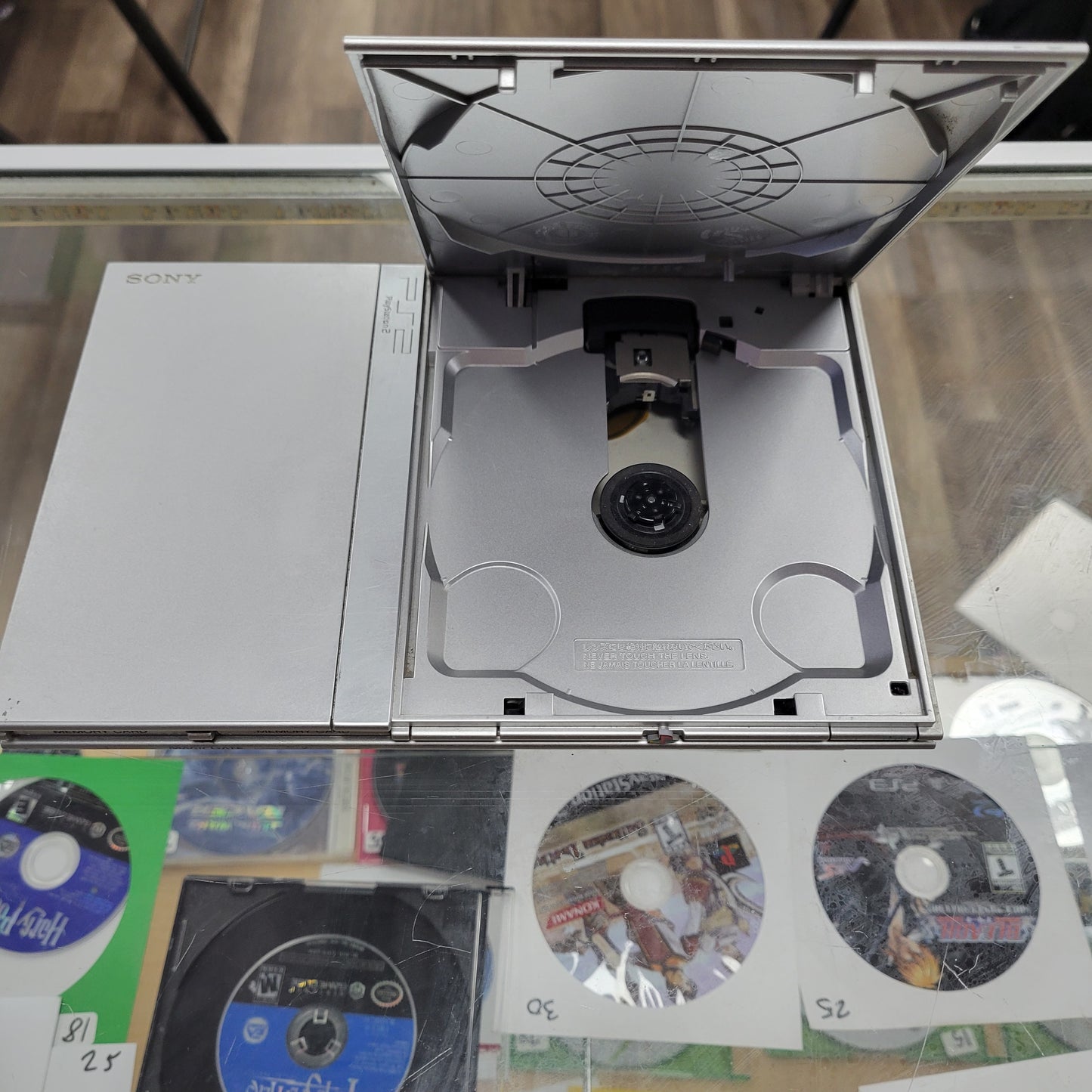 Silver Playstation 2 Slim System comes with controller and cables 8 MB memory card