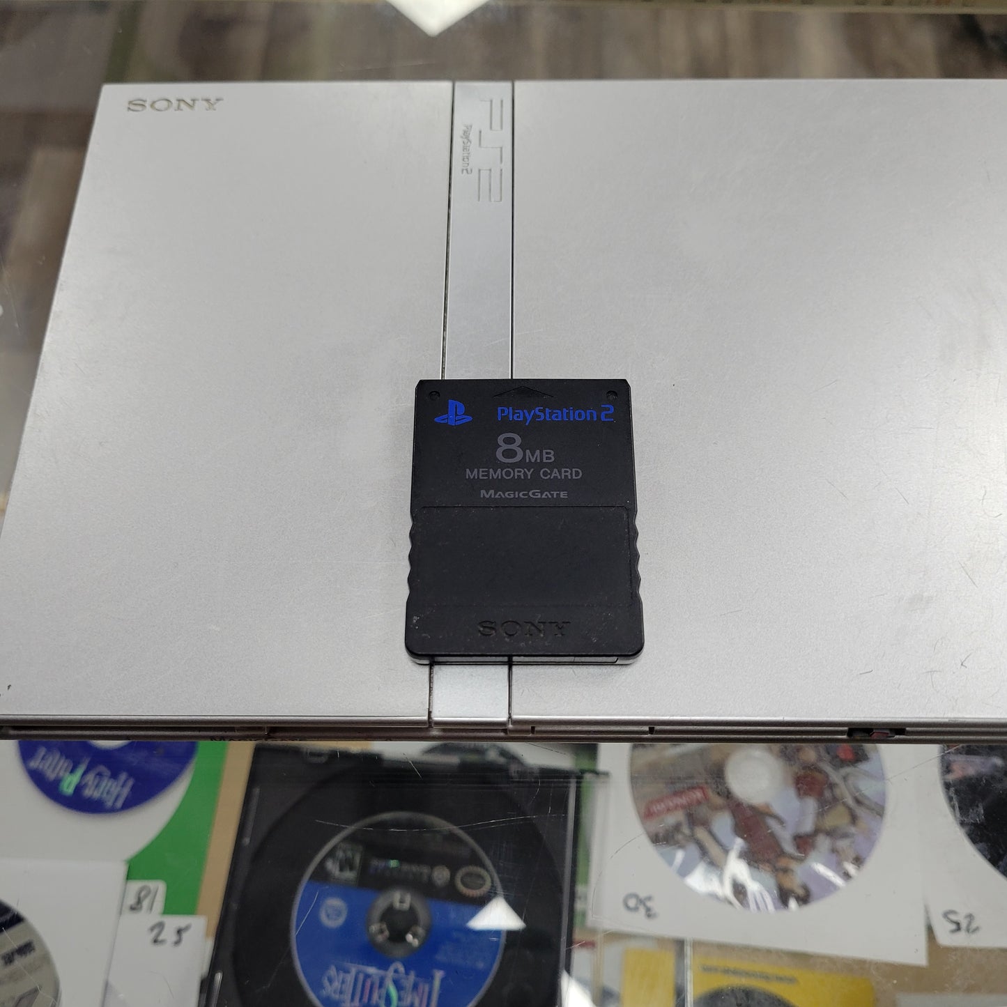 Silver Playstation 2 Slim System comes with controller and cables 8 MB memory card