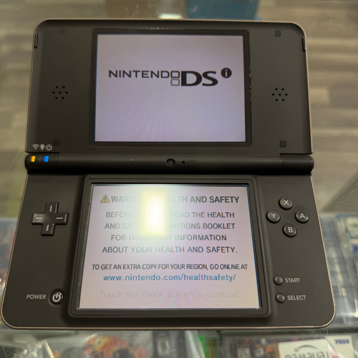 Nintendo DSi XL Bronze Nintendo DS System (Charger Included)