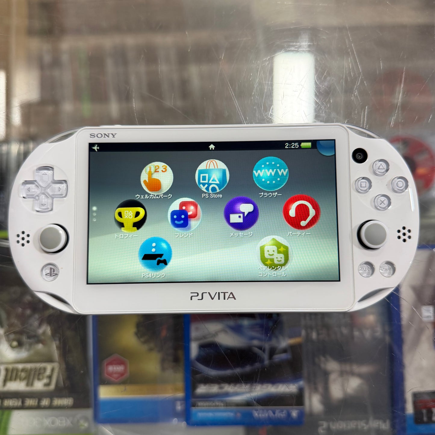 White Playstation Vita 2000 Handheld System with Charger (JP) (Region Free)
