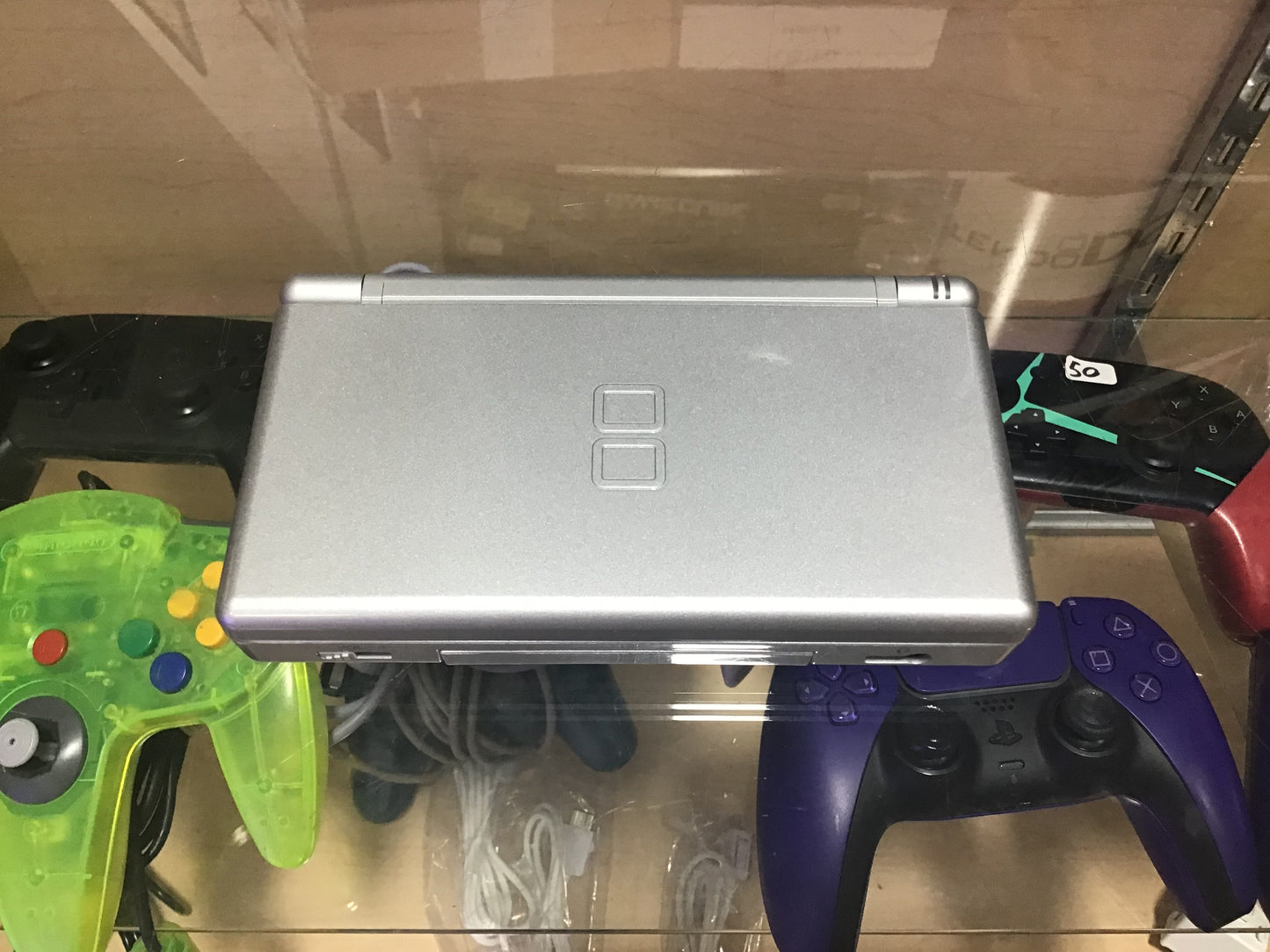 Silver Nintendo DS Lite Handheld System with Charger and Box