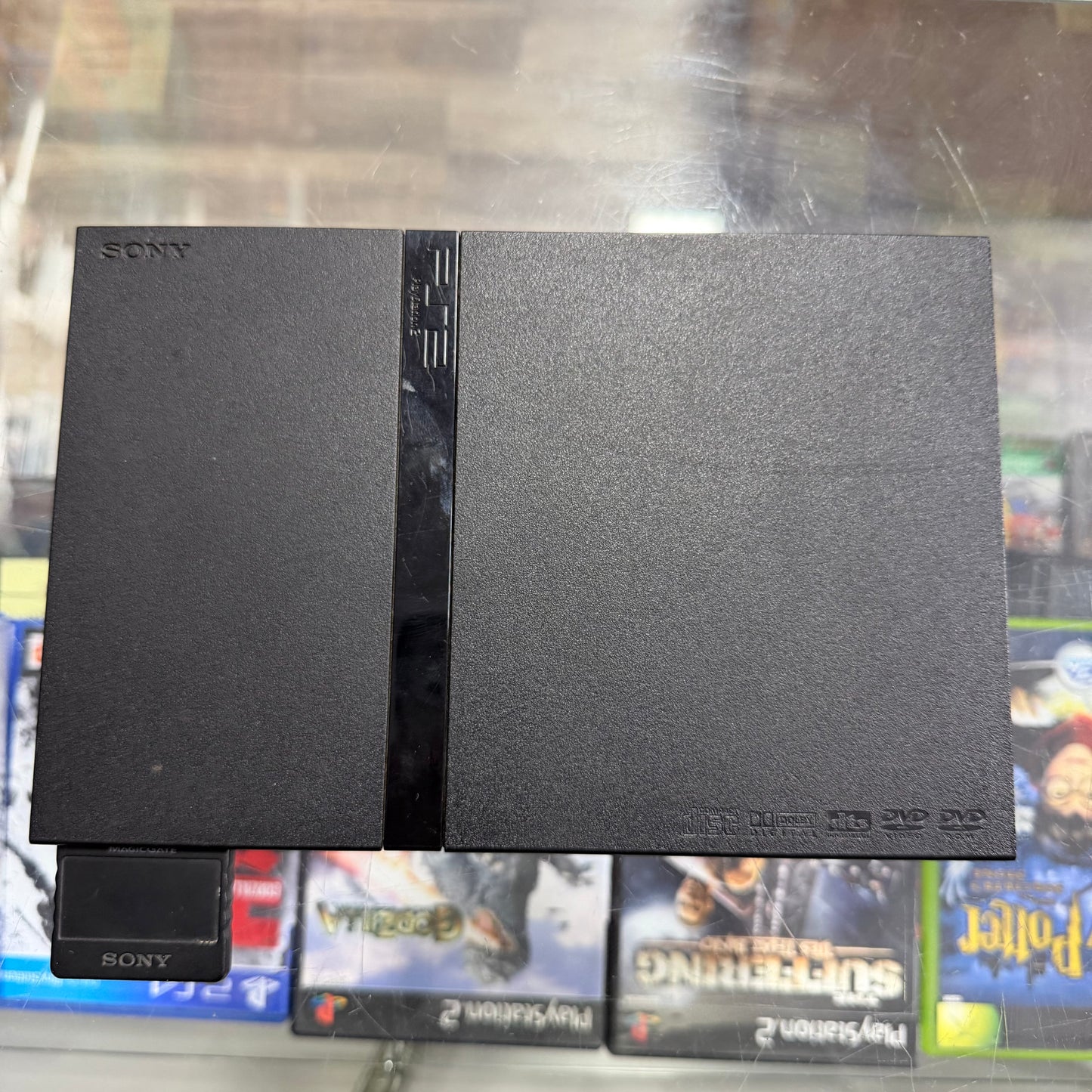 Slim Playstation 2 System
(cables controller and memory card included)(NEW LASER)