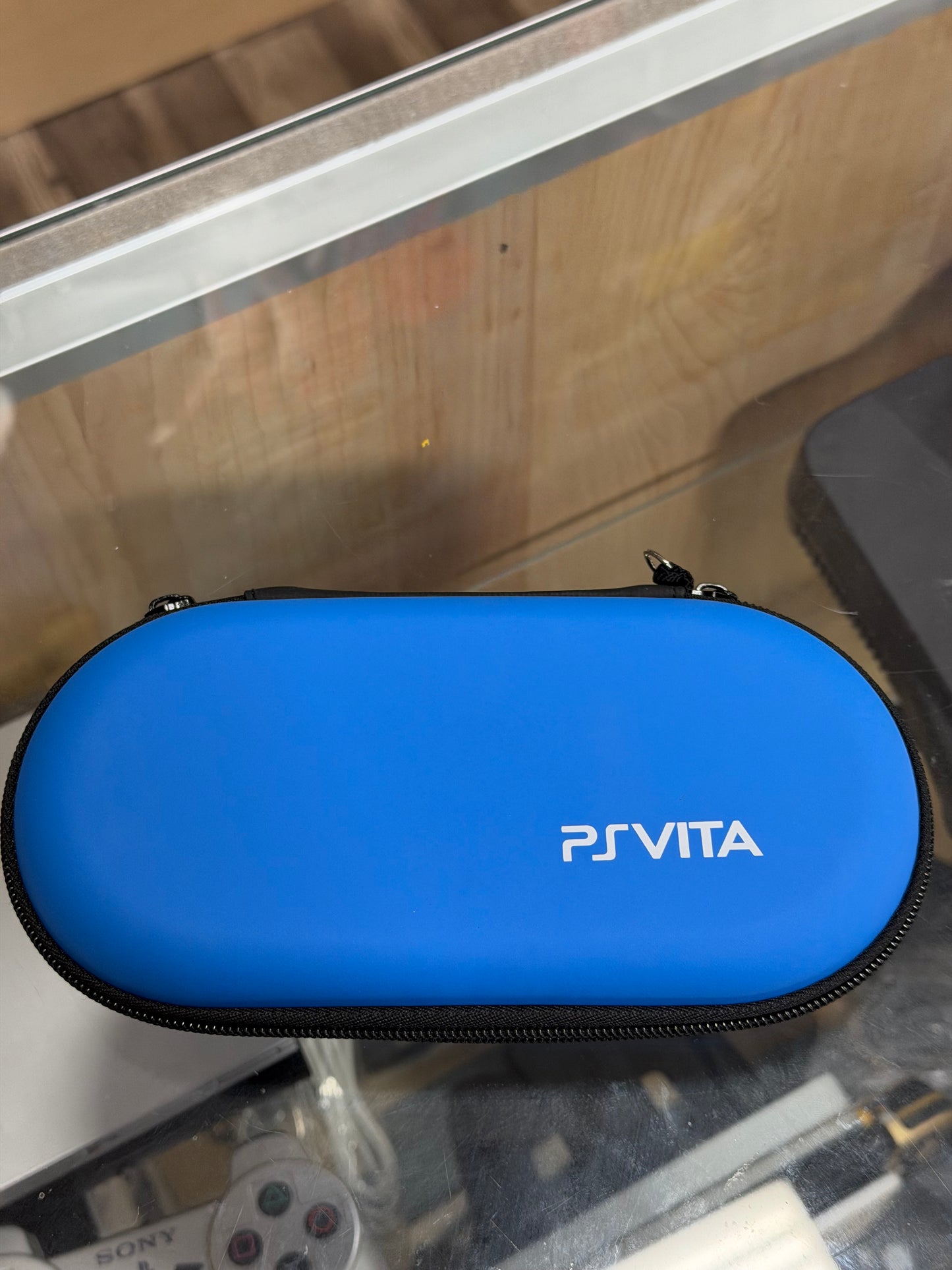 PS Vita - with Charger and Digital Games