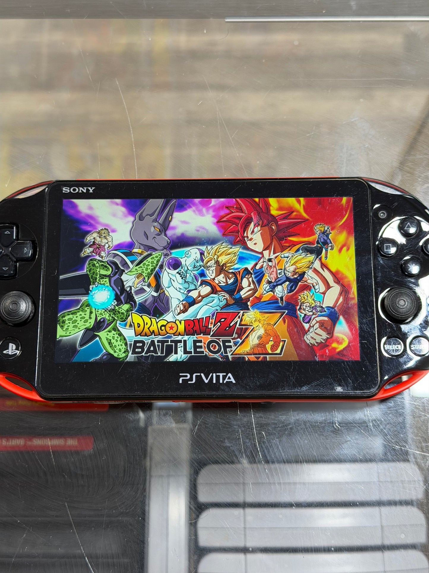 PS Vita - with Charger and Digital Games