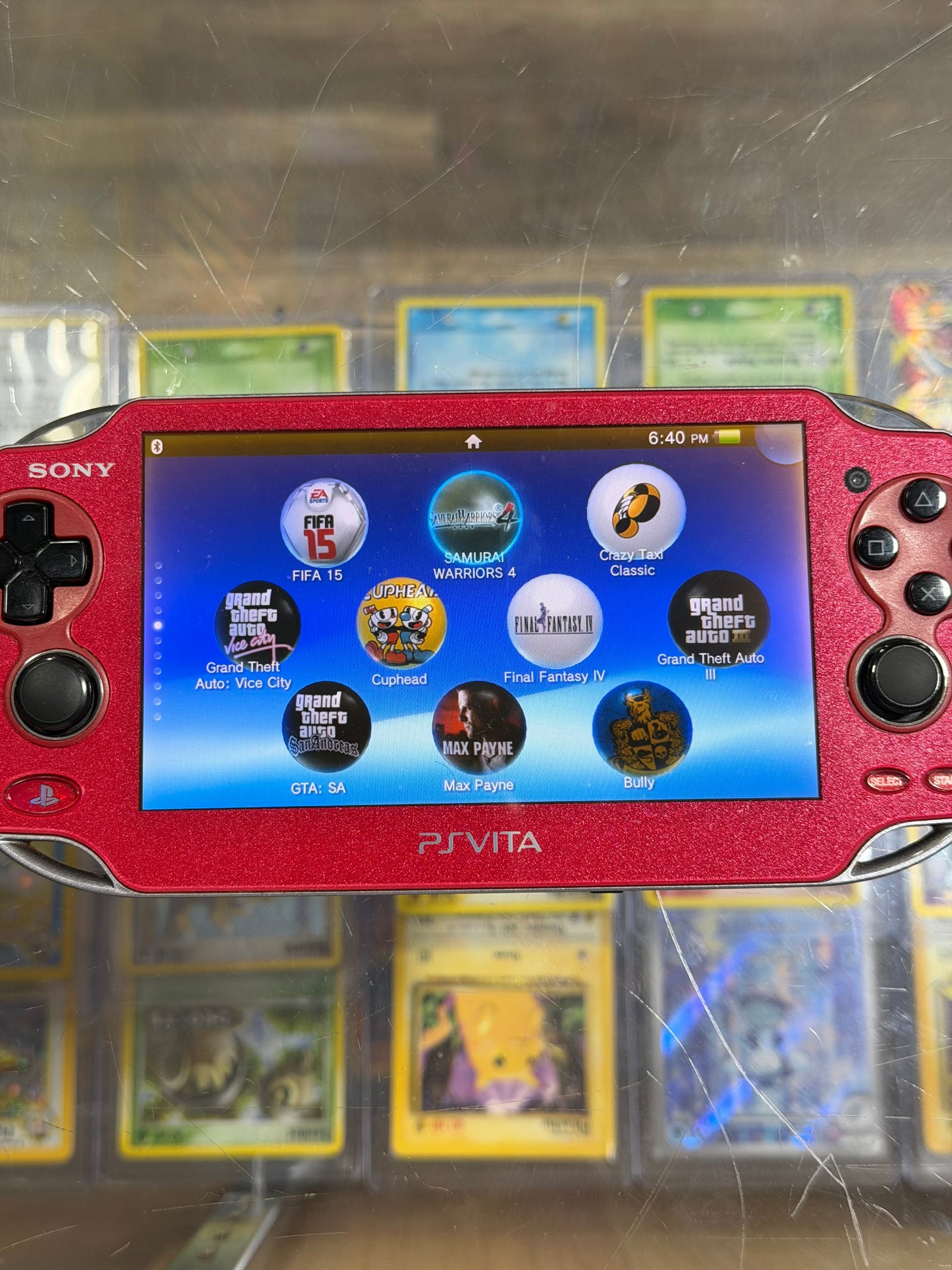 PlayStation Vita Red OLED Handheld System with Charger (Digital Games)