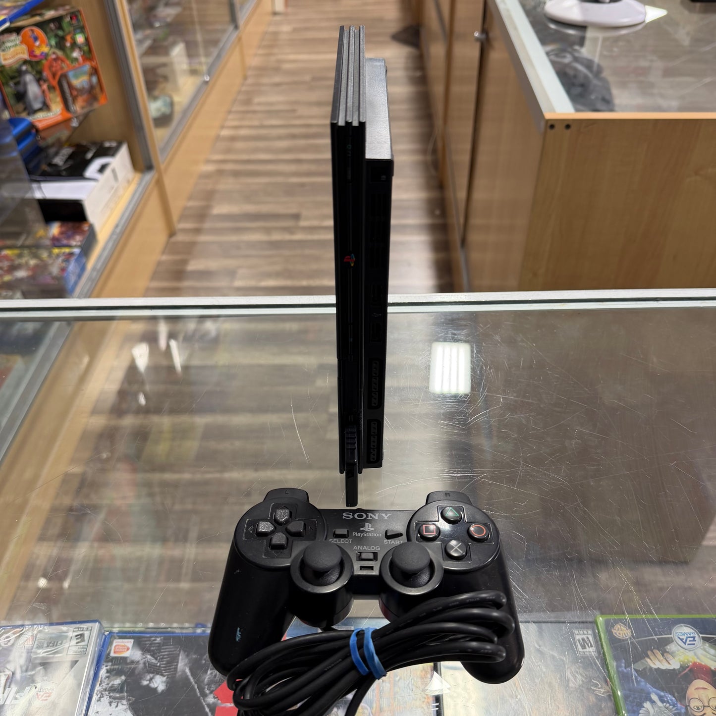 Slim Playstation 2 System
(cables controller and memory card included)(NEW LASER)