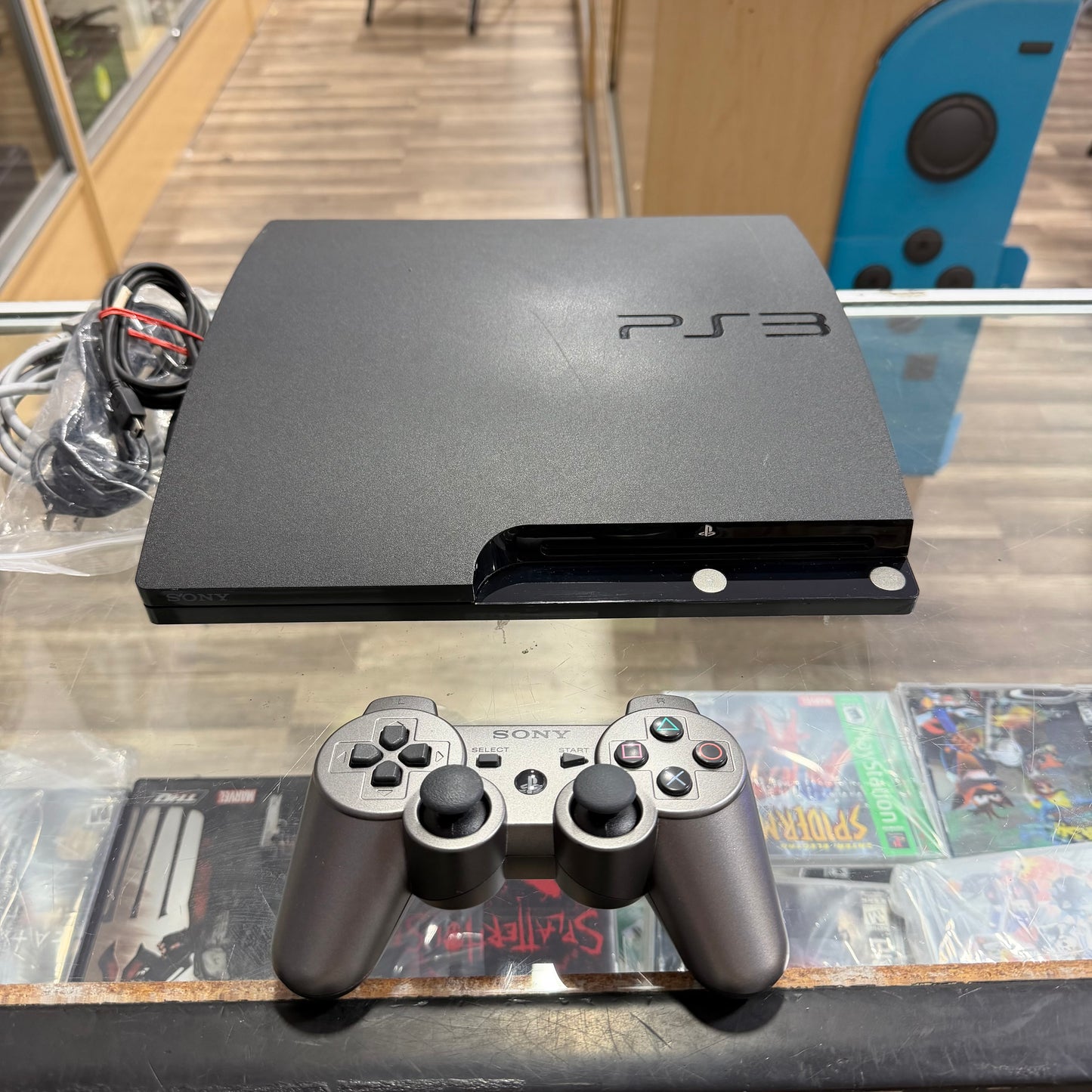 Playstation 3 Slim System 250GB Playstation 3 (controller cables included)