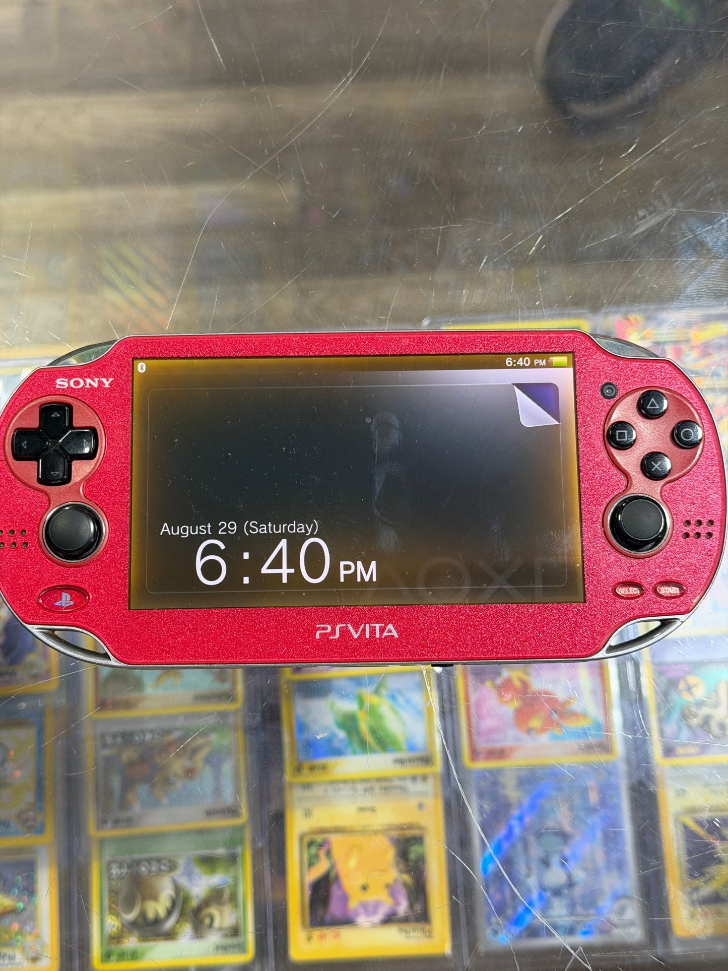 PlayStation Vita Red OLED Handheld System with Charger (Digital Games)