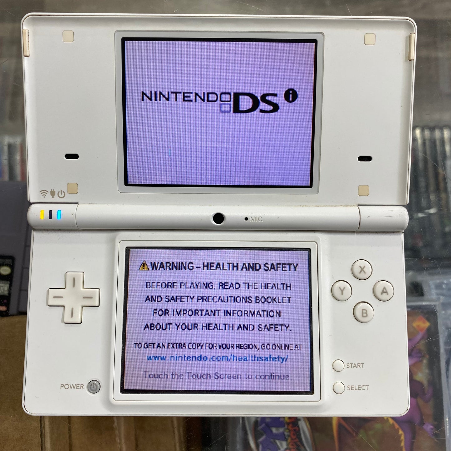 White Nintendo DSi With Charger (no stylus)