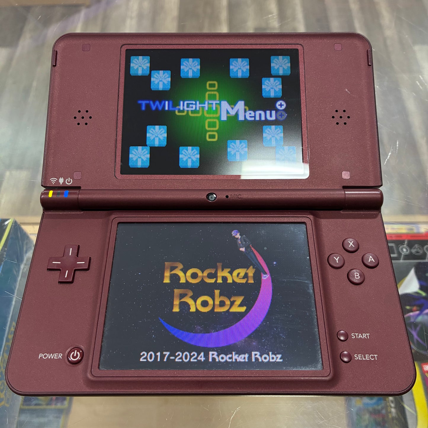 Nintendo DSi XL Handheld System (Burgundy) w/ Digital Games & Charger