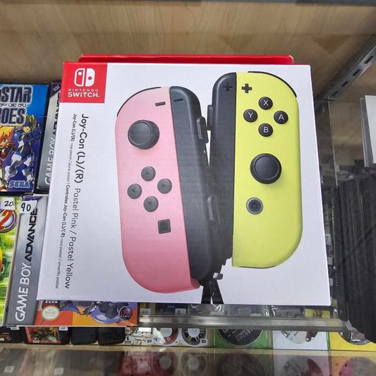 Nintendo Switch Joy Cons Pastel Pink and Yellow New