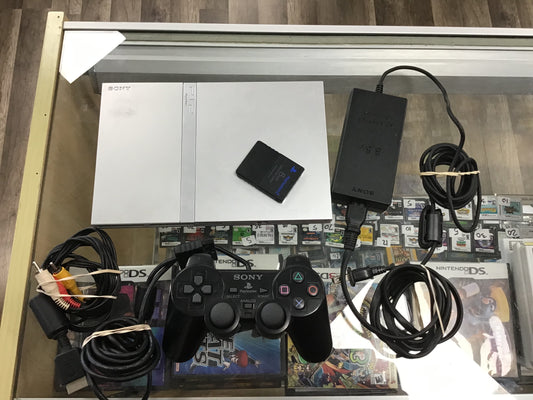 PlayStation 2 Slim Silver System with wires and one controller