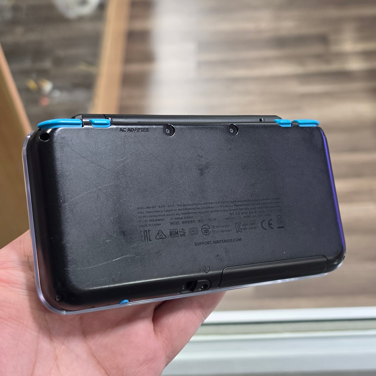 New Nintendo 2DS XL Black + Turquoise Handheld System with Charger (Digital Games)