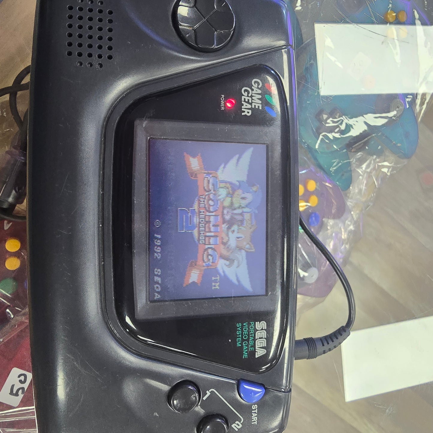 Sega Game Gear (RECAPPED) with game and case