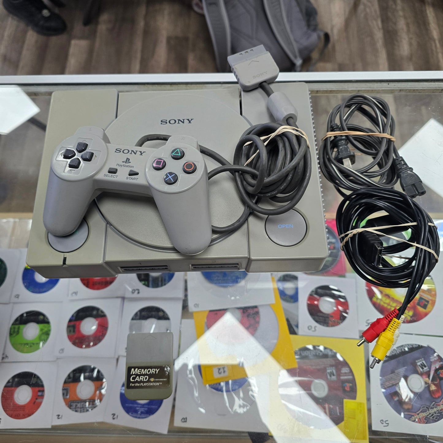 PlayStation 1 System with controller and wires