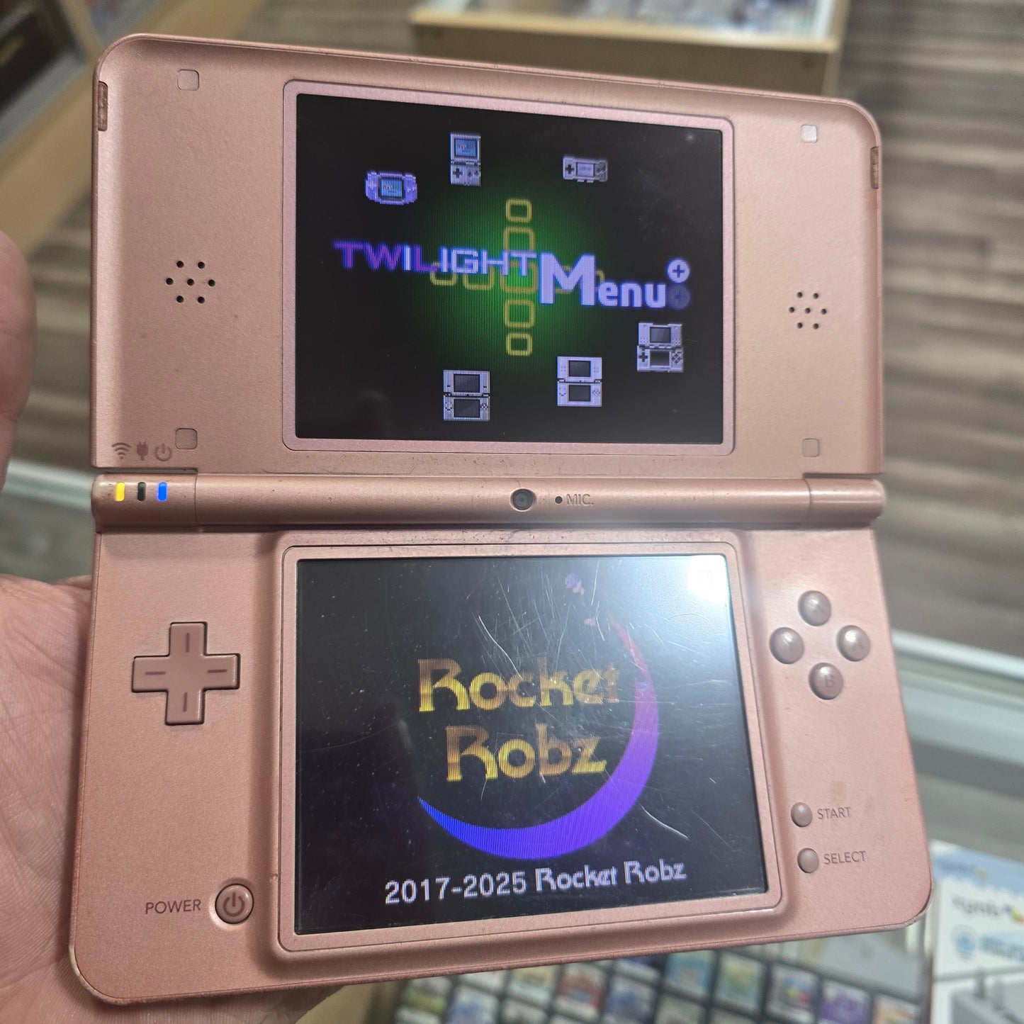 Pink Nintendo DSi XL Handheld System with Charger - Digital Pokémon Games