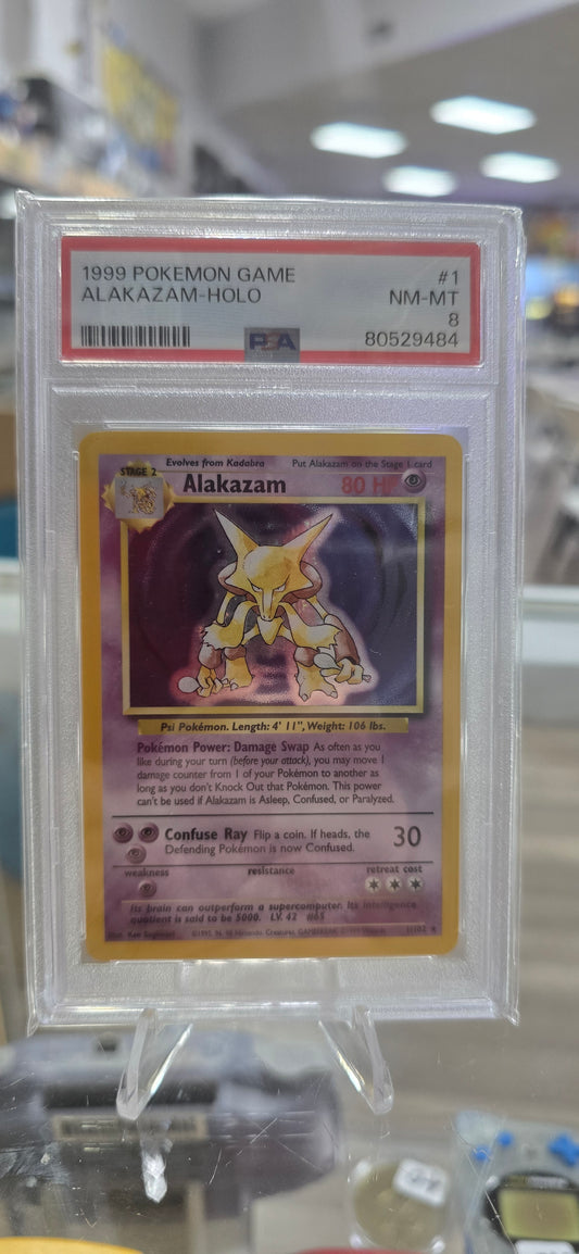 Pokémon TCG Alakazam Base Set 1/102 Holo PSA 8 (NM)