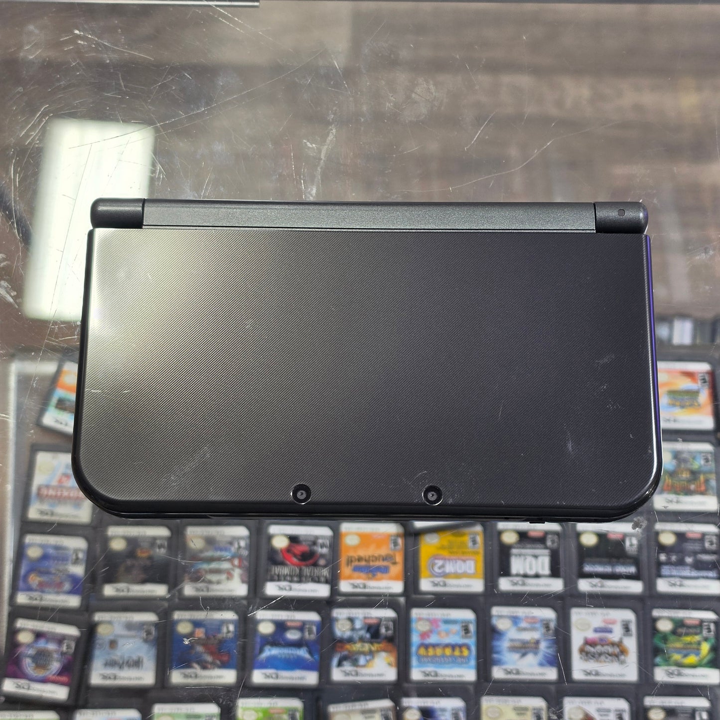 New Nintendo 3DS XL Black Nintendo 3DS Handheld System (Charger included)