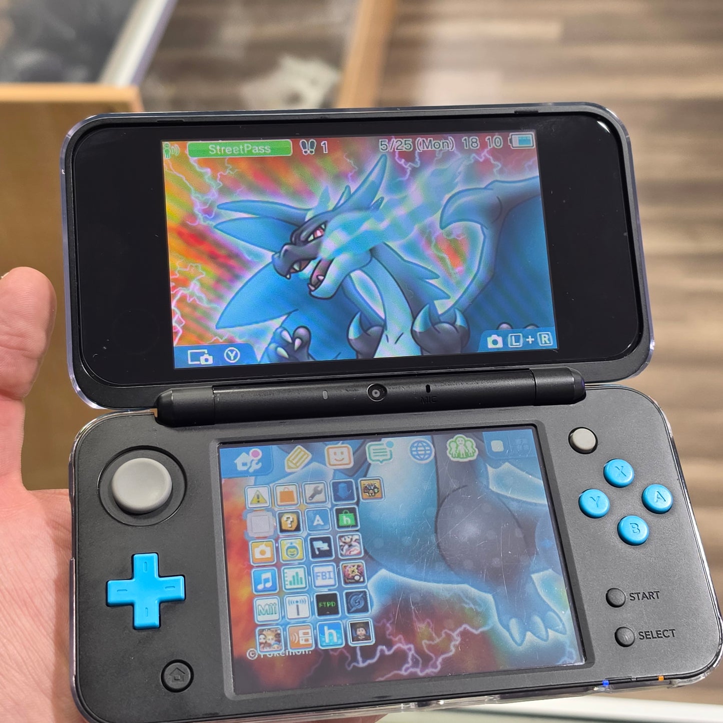 New Nintendo 2DS XL Black + Turquoise Handheld System with Charger (Digital Games)