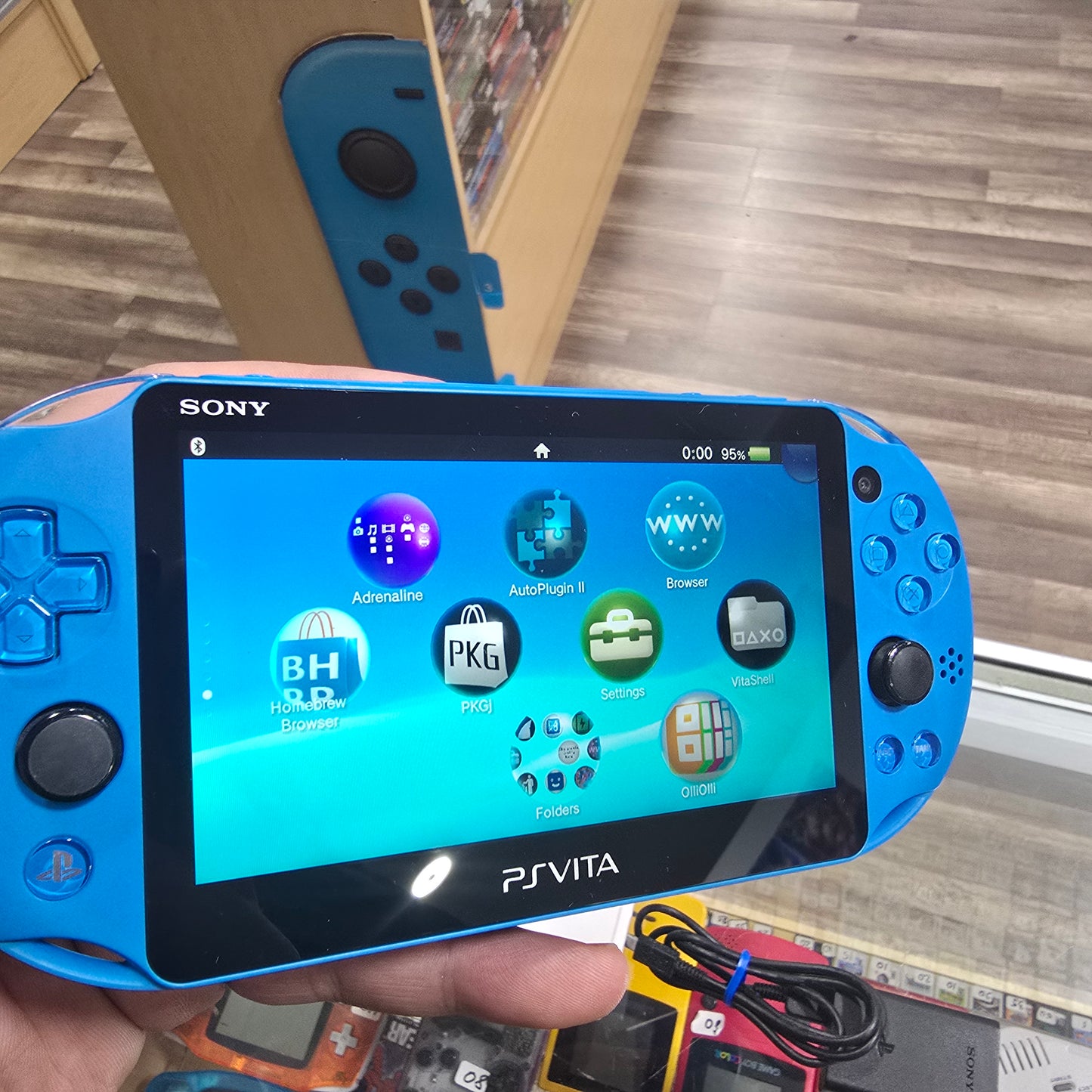 PlayStation Vita Slim Aqua Blue Console Playstation Vita 2000 (with digital games)