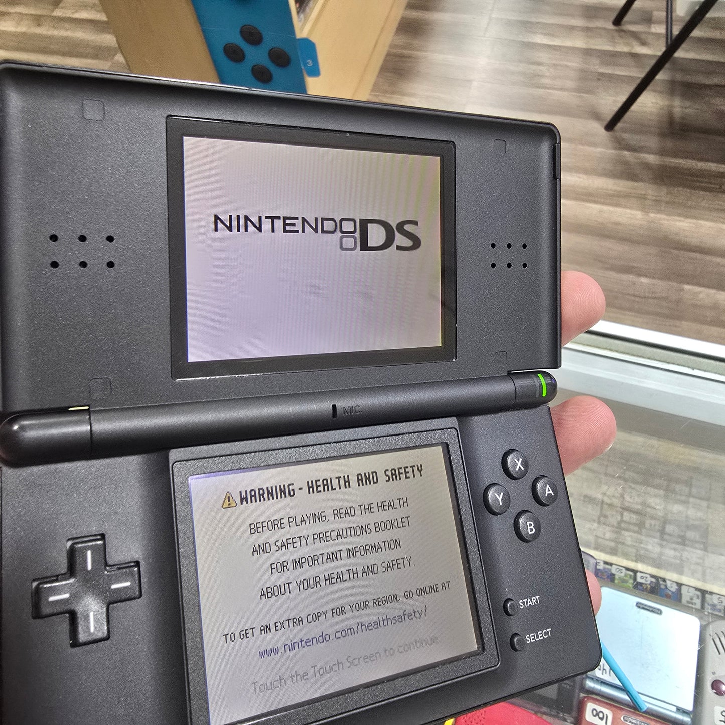 Black Nintendo DS Lite Handheld System with Charger