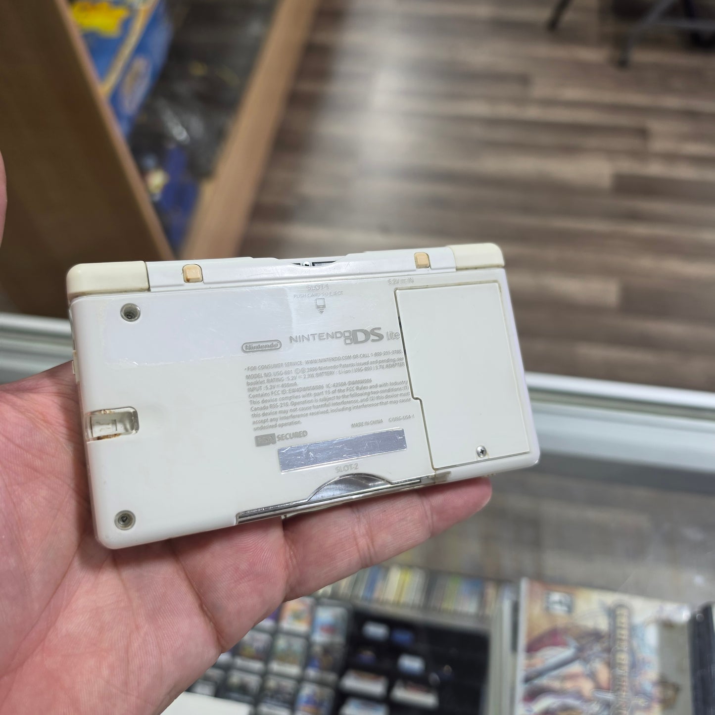White Nintendo DS Lite Handheld System with Charger